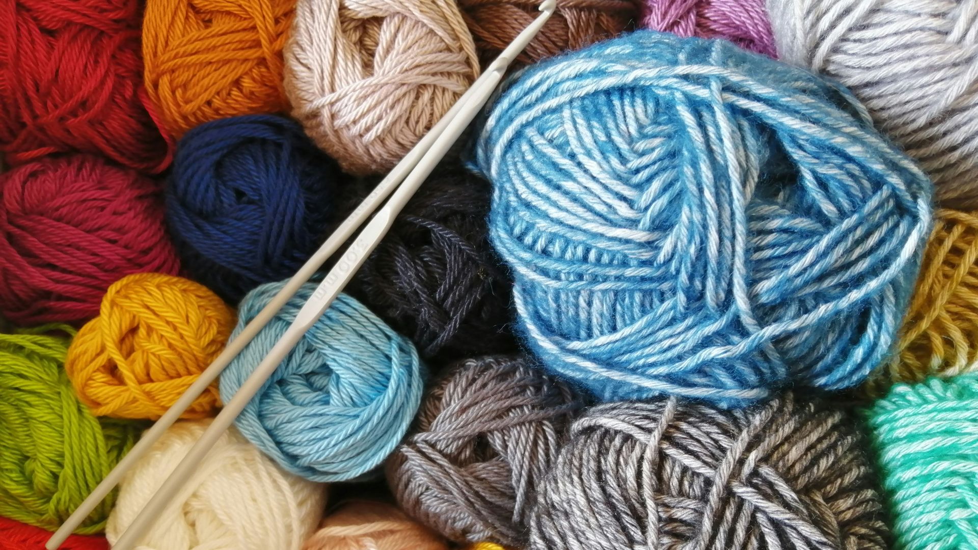 orange blue and white yarn