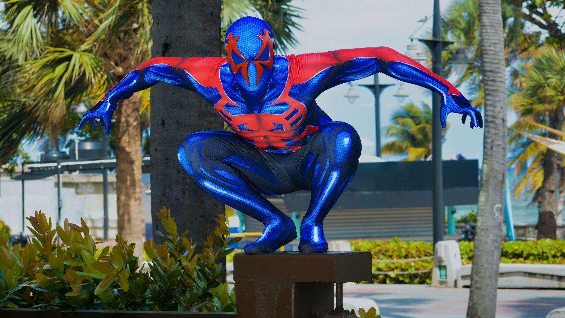 a statue of a man in a spider suit