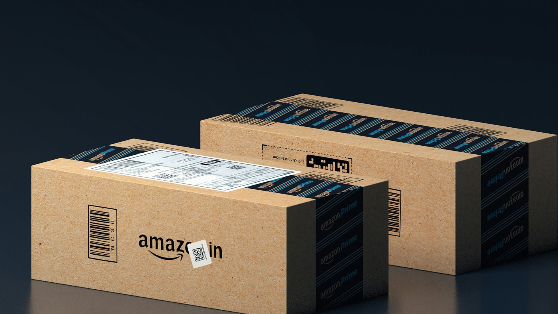 two boxes of amazon are stacked on top of each other