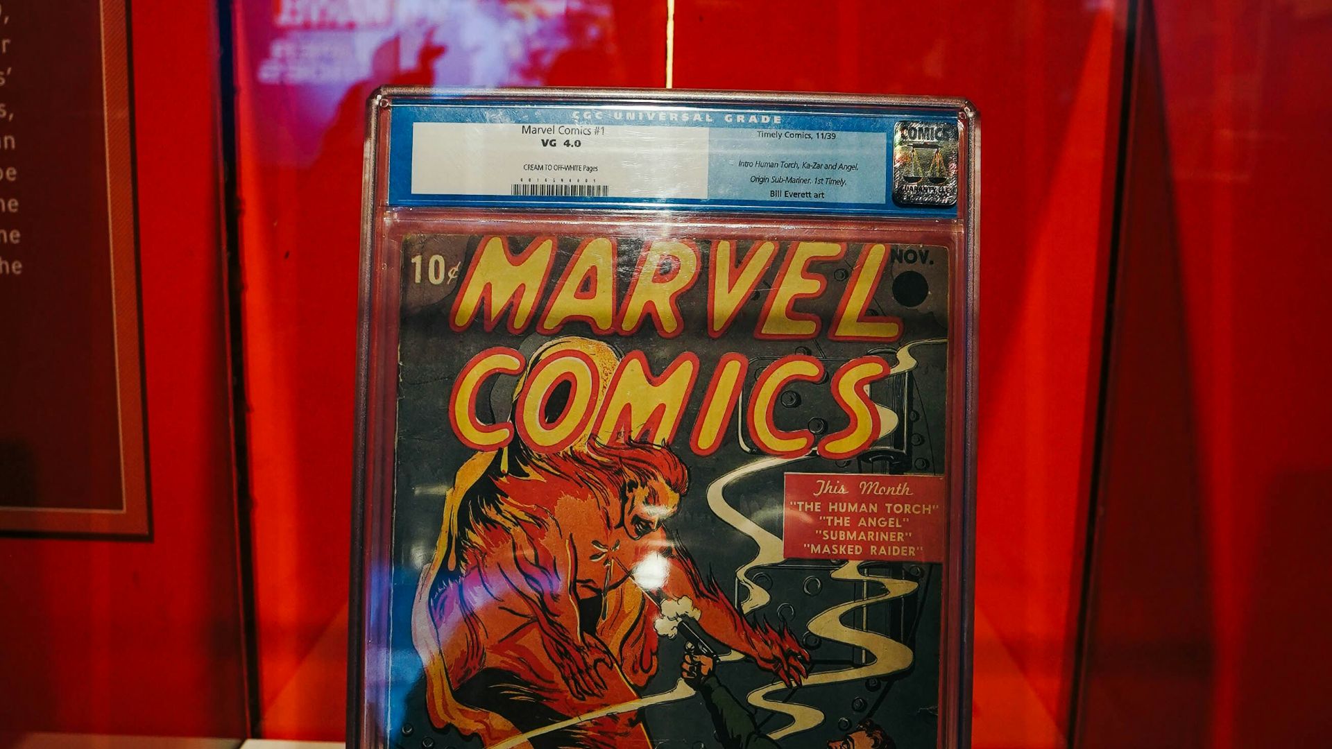 a comic book on display in a glass case