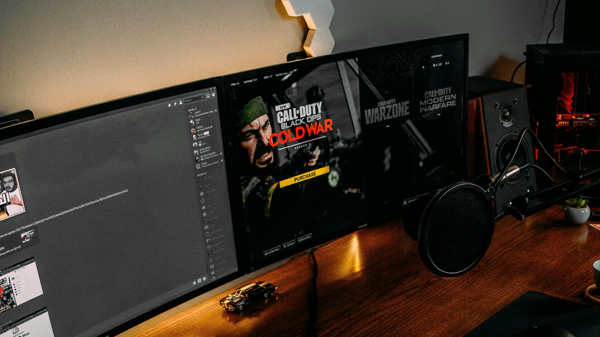 black flat screen computer monitor turned on beside black computer keyboard