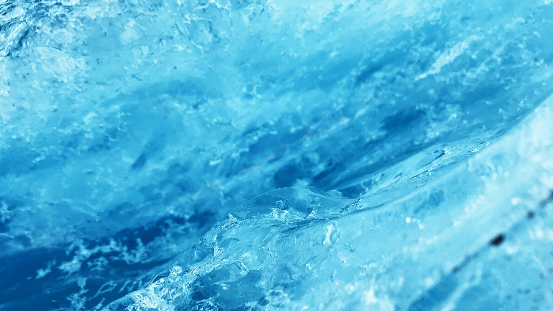 a close up of a wave in the ocean