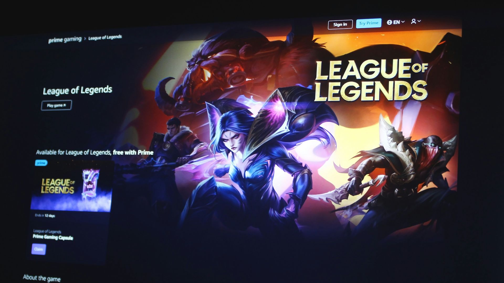 a computer screen with a league of legend logo on it