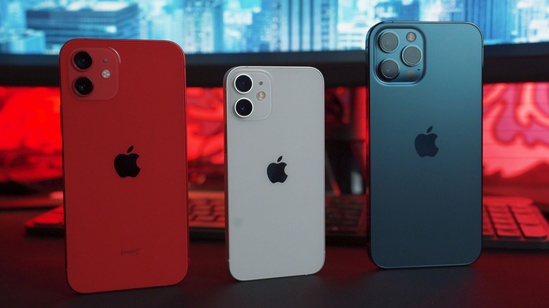 silver iphone 6 and red iphone case
