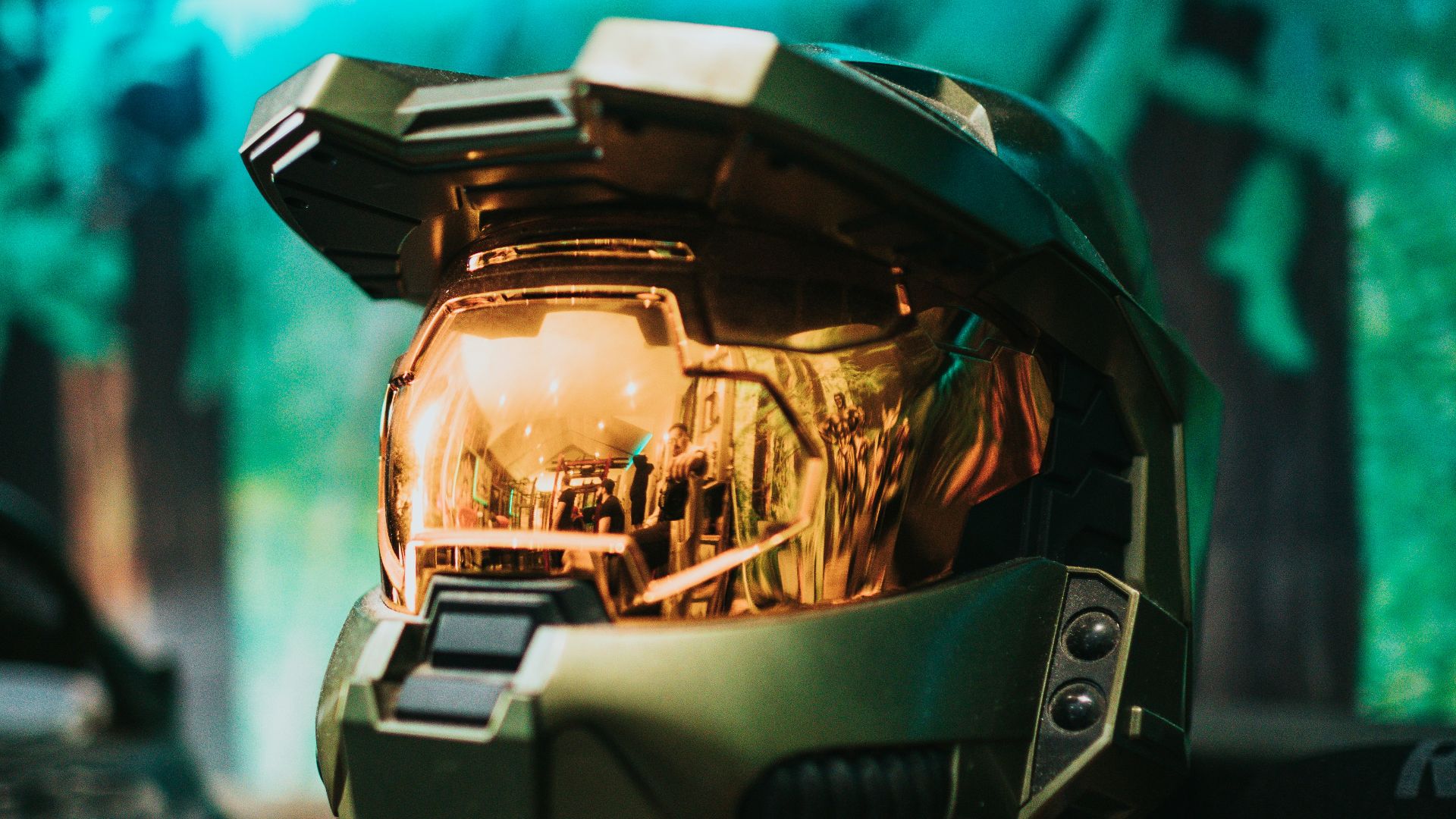 black and gray helmet on black and white textile