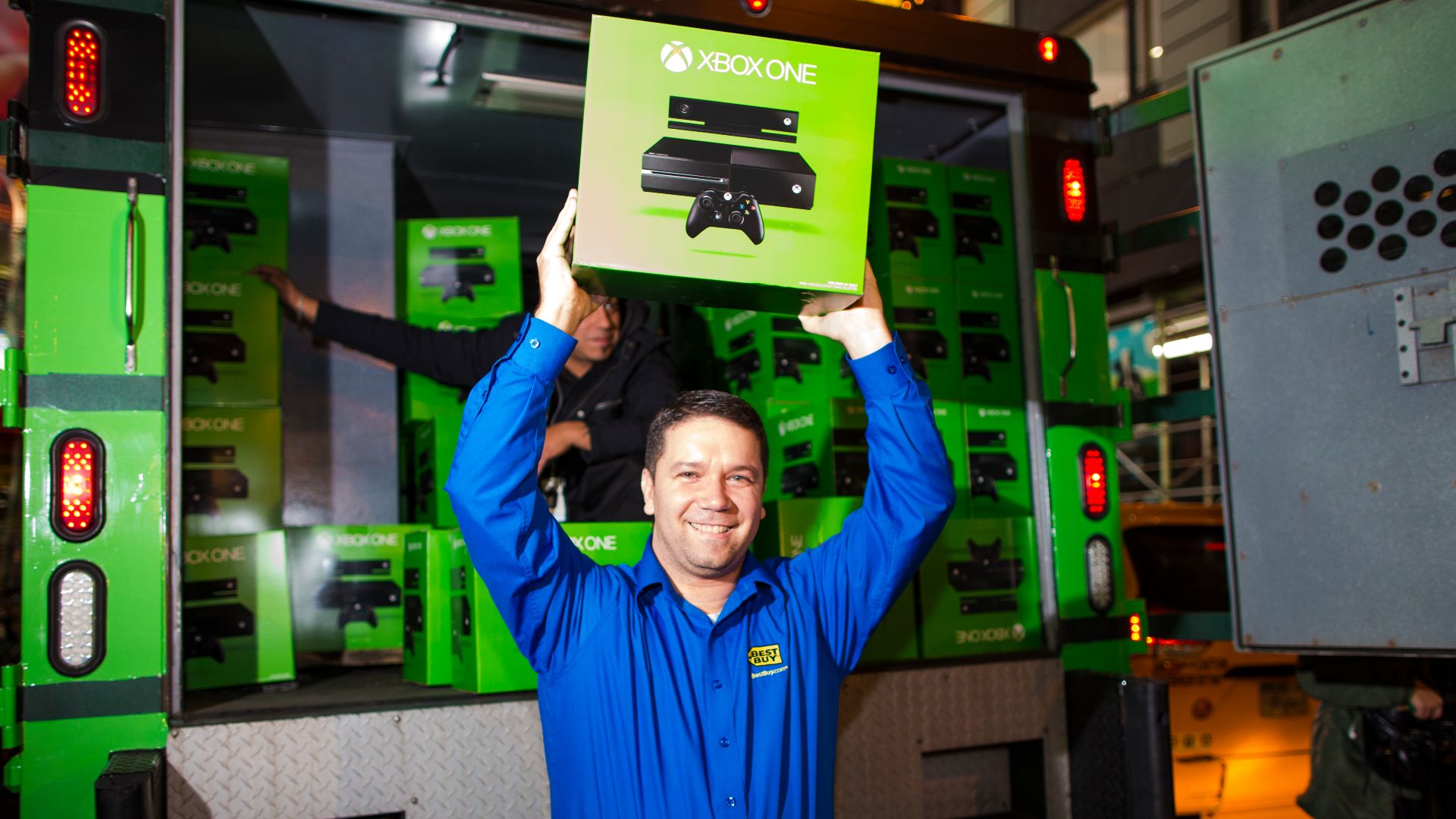 File:Xbox One Launch Best Buy Holding Console.jpg
