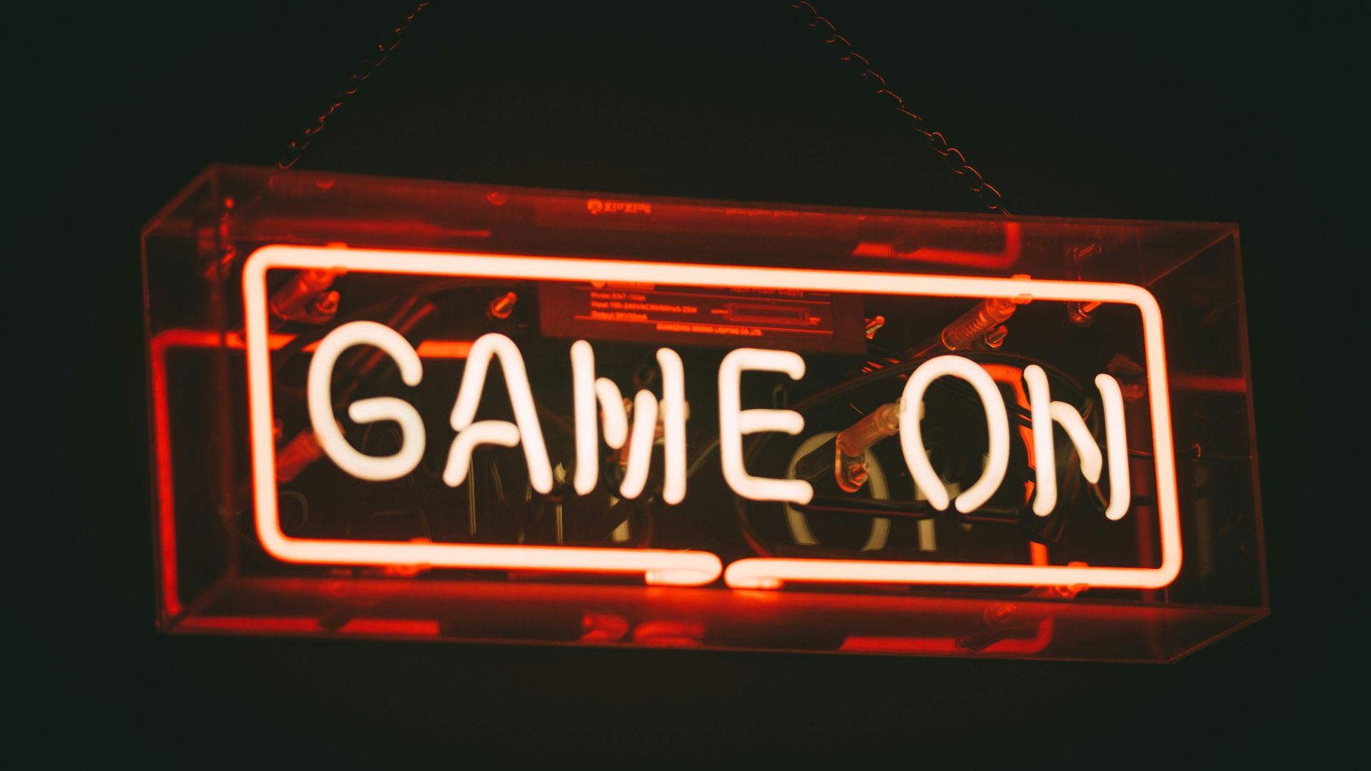 red and white Game On LED signage