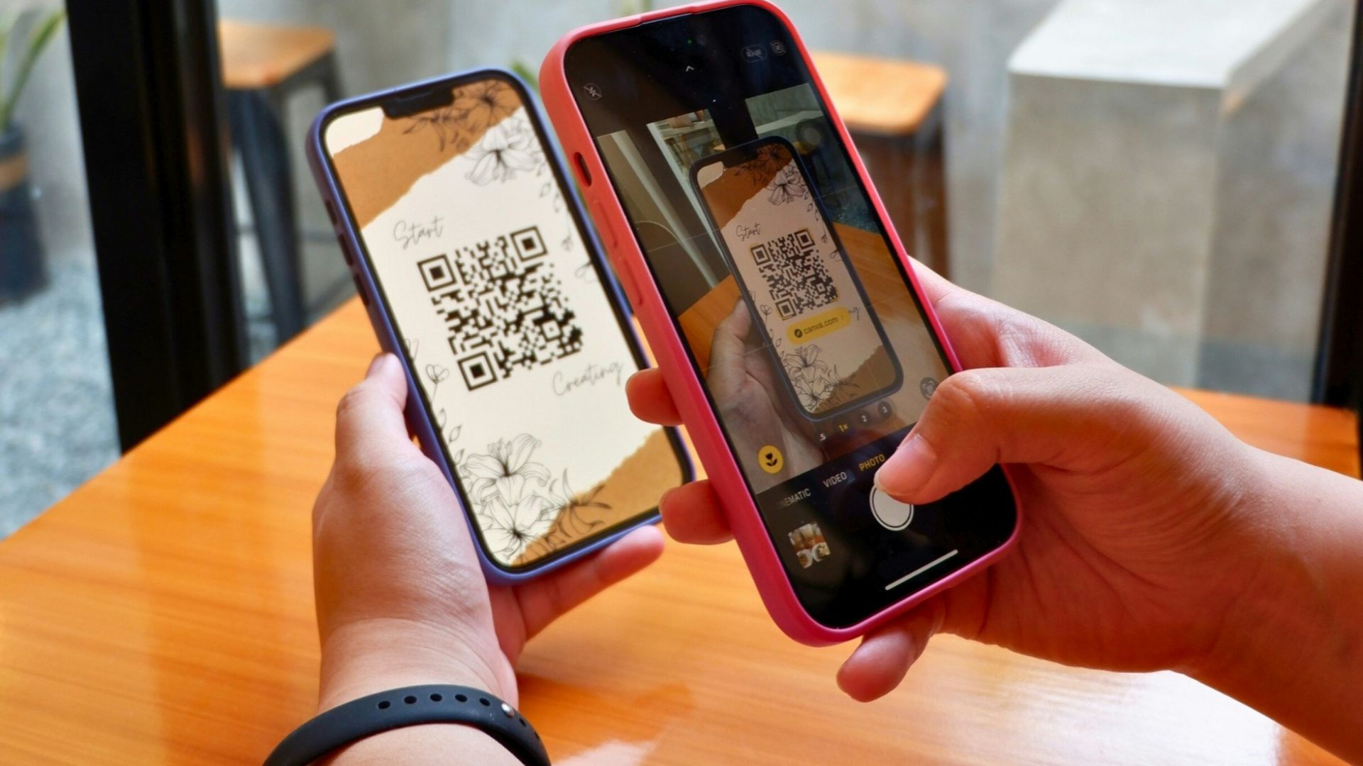 a person holding a smart phone in their hand