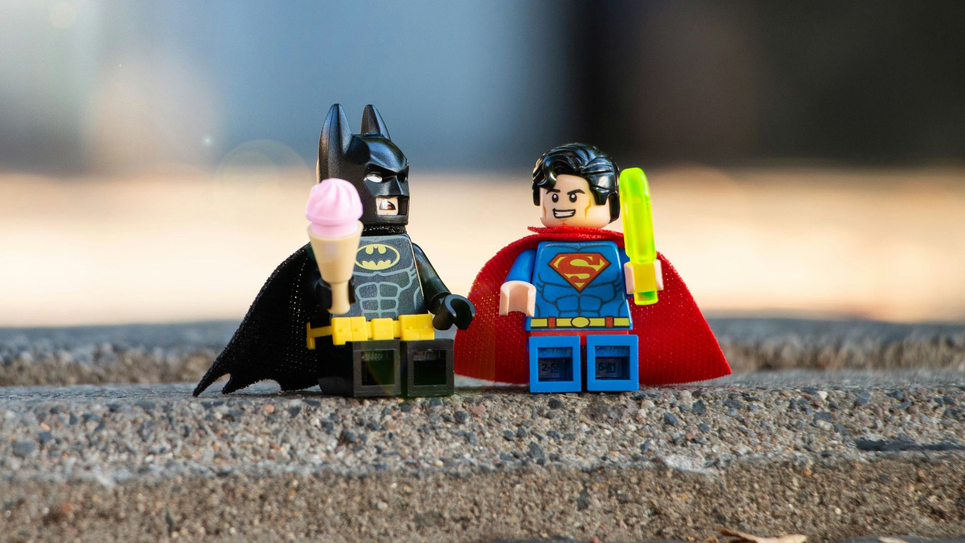 lego mini figure on brown sand