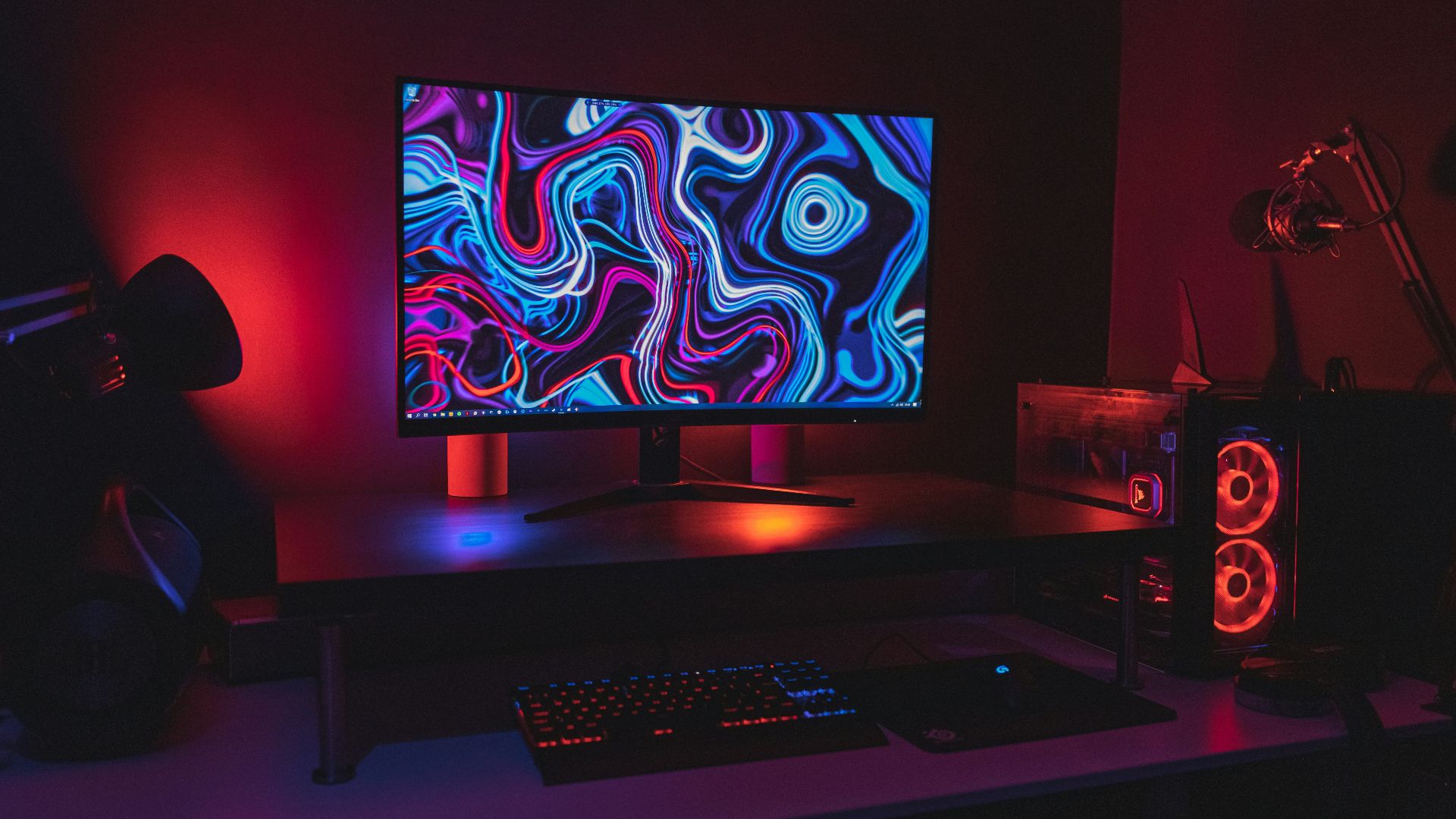 black flat screen computer monitor turned on near black computer keyboard