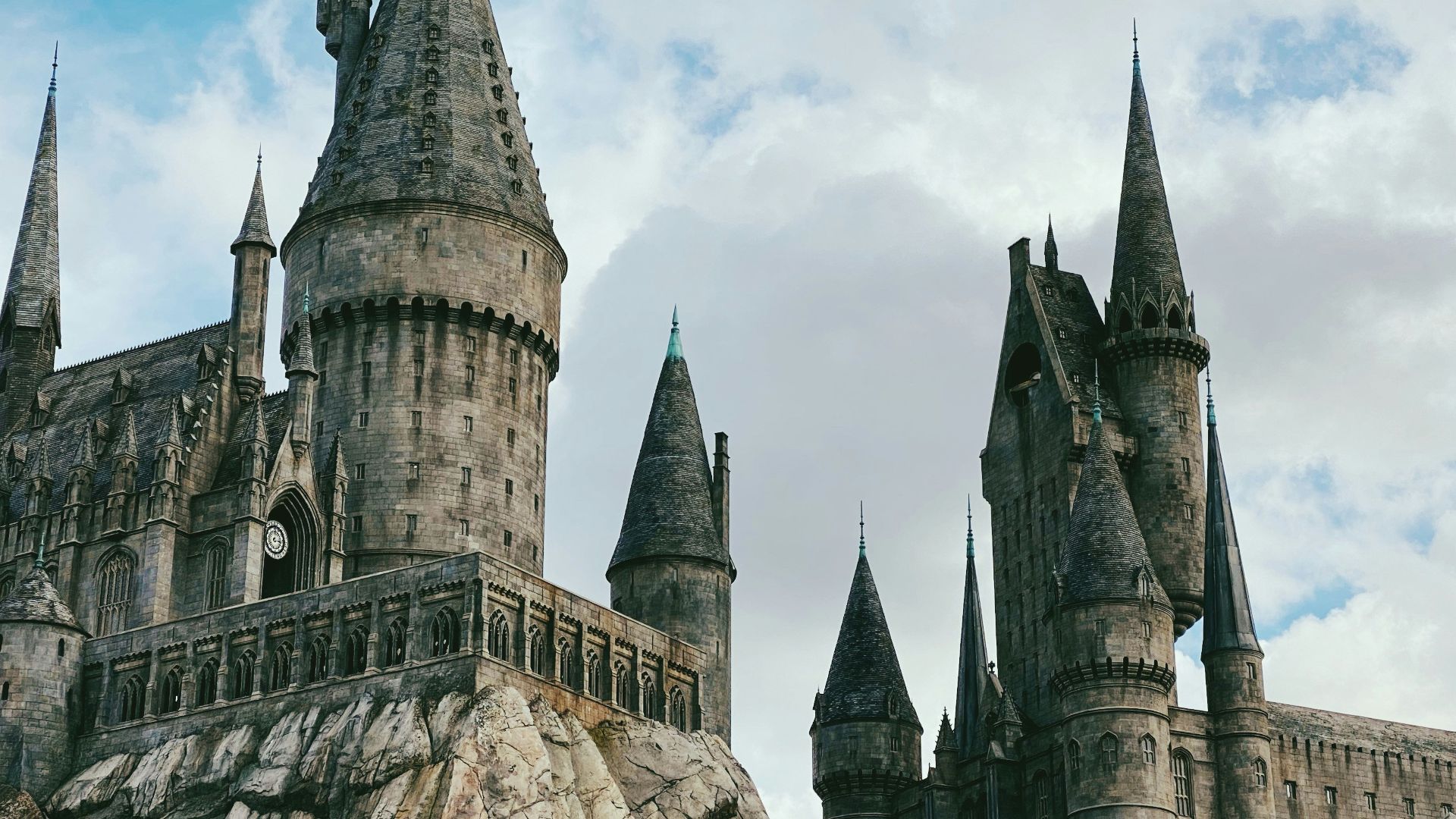 grey concrete castle under blue sky during daytime