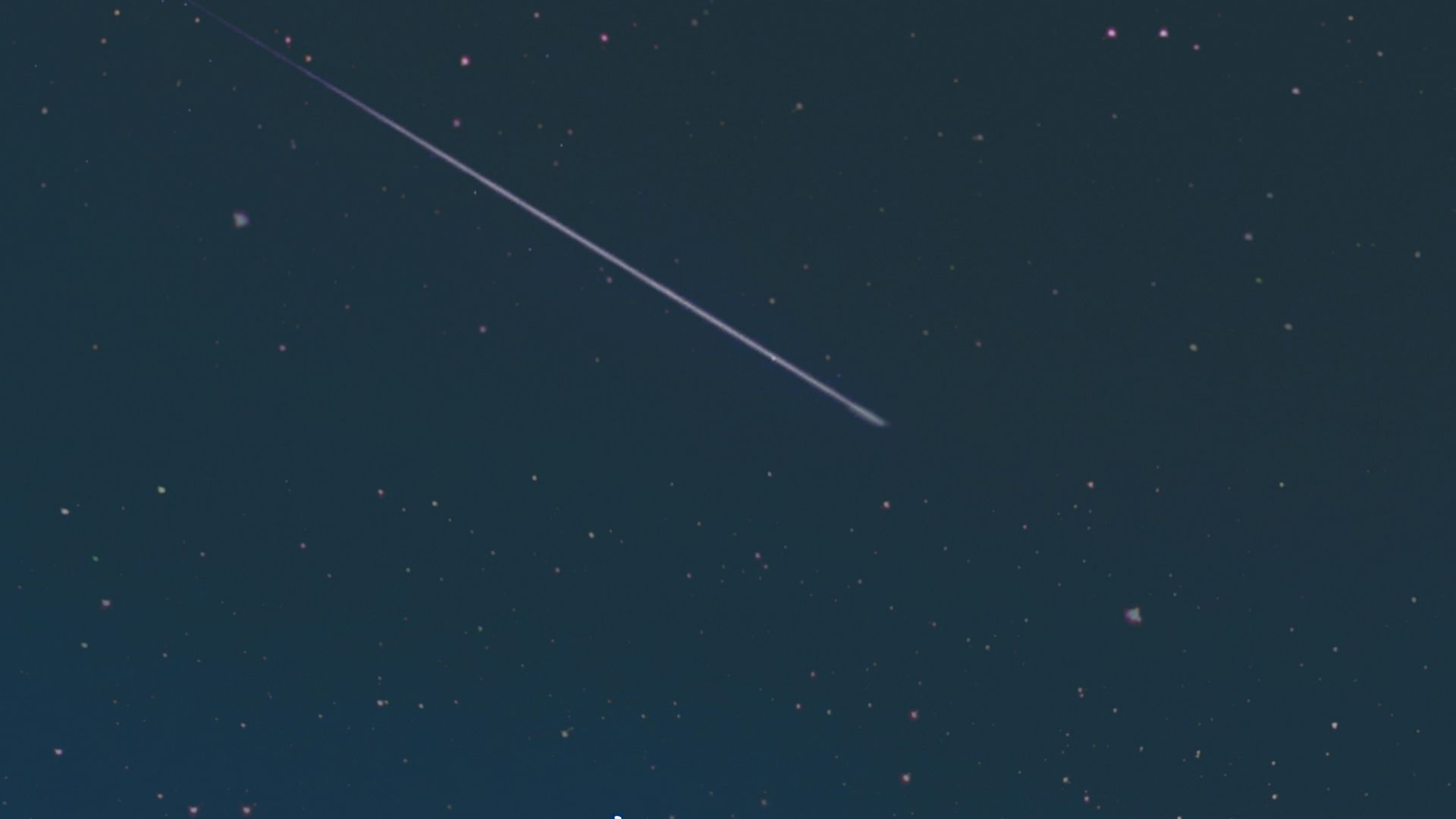 shooting star in night sky