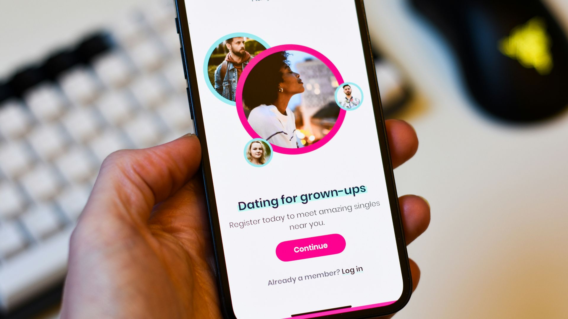 a person holding a cell phone in their hand