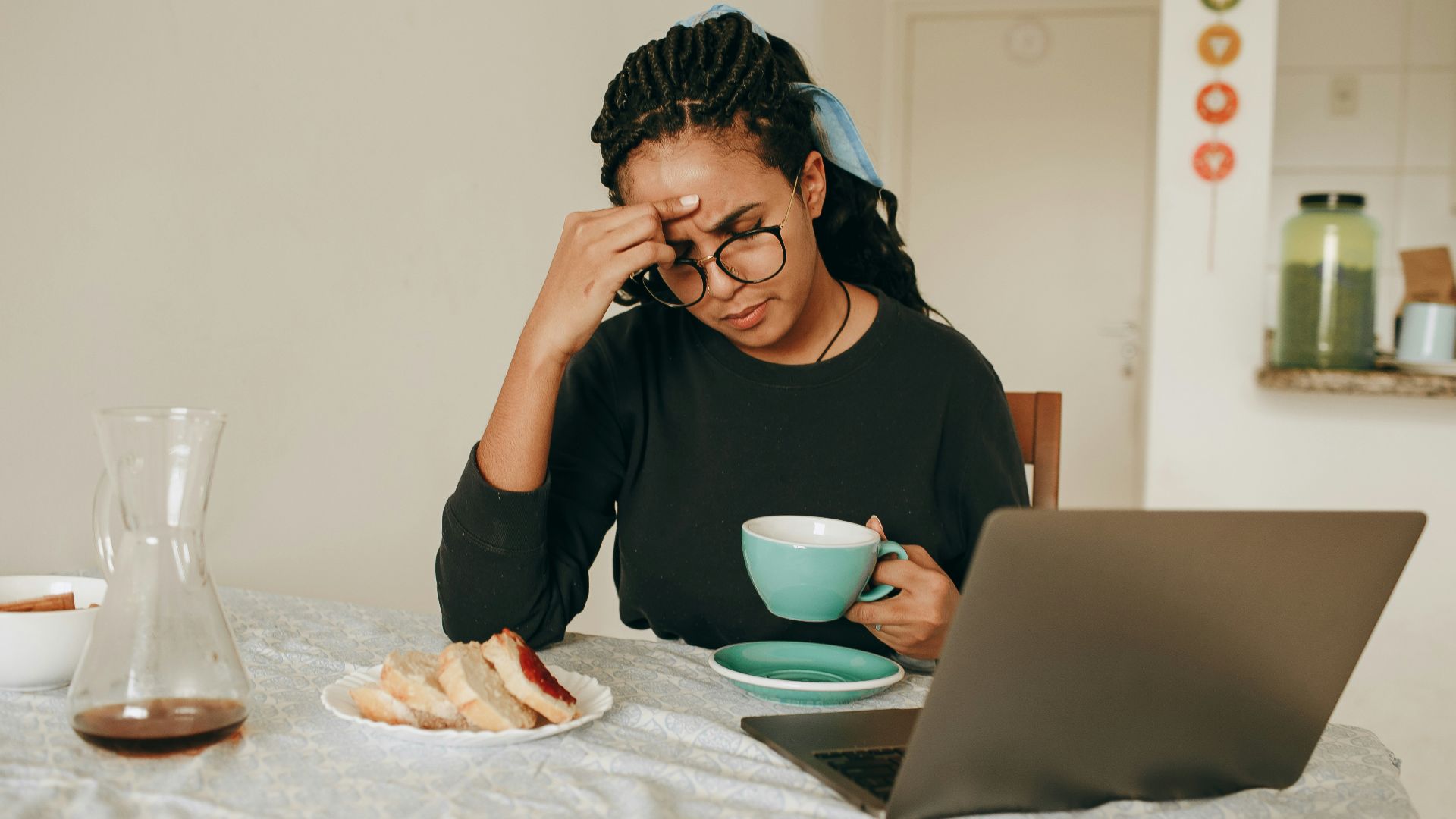 woman in black long sleeve shirt sitting on chair
