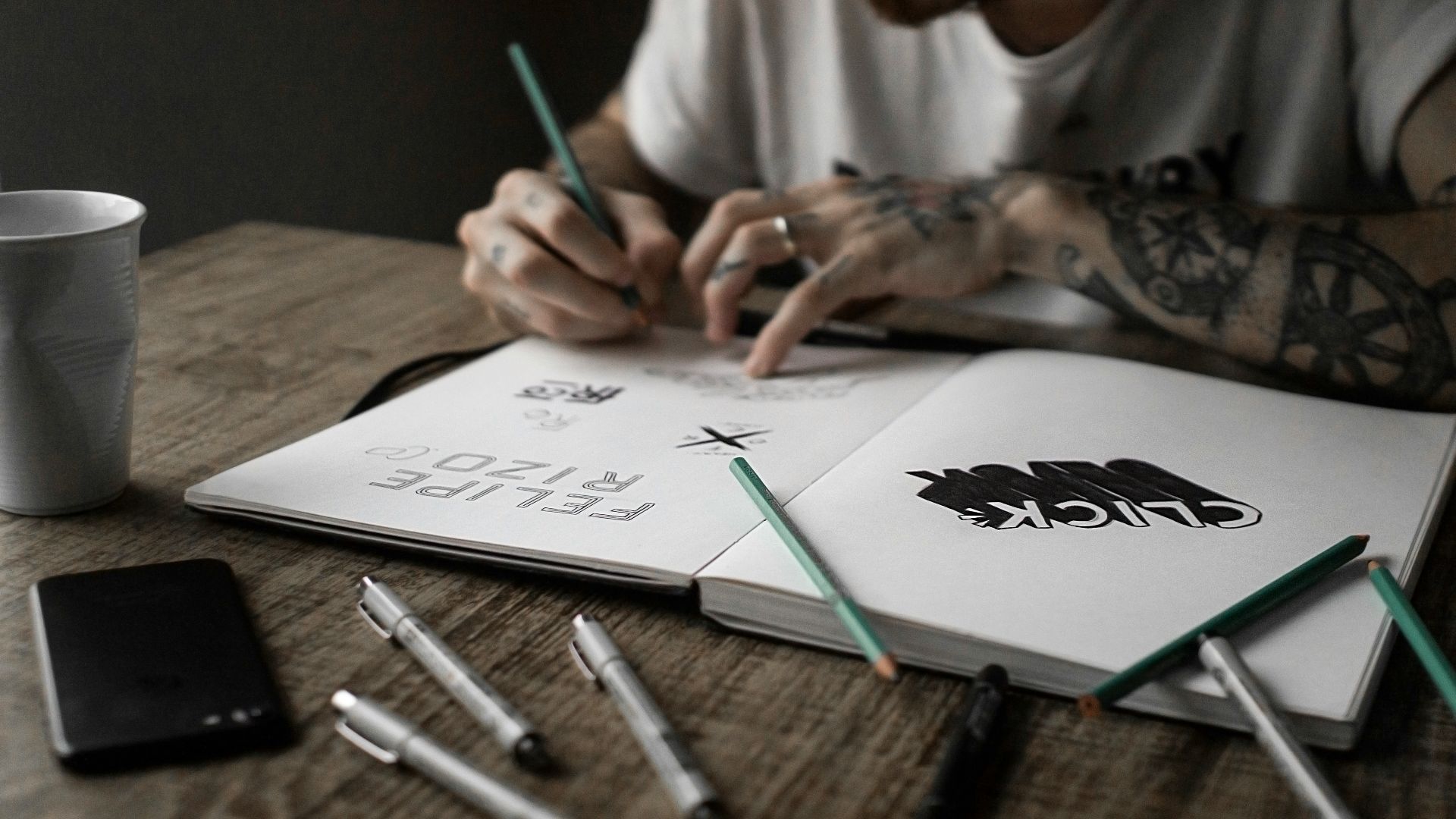 person writing on book