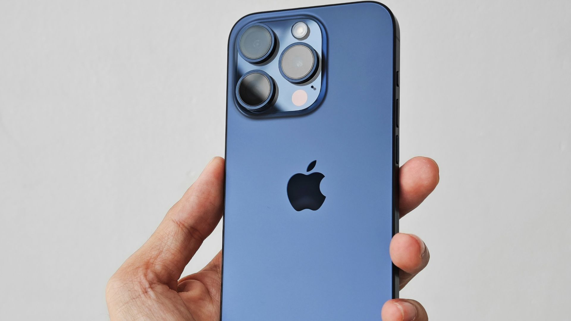 a person holding an iphone in their hand