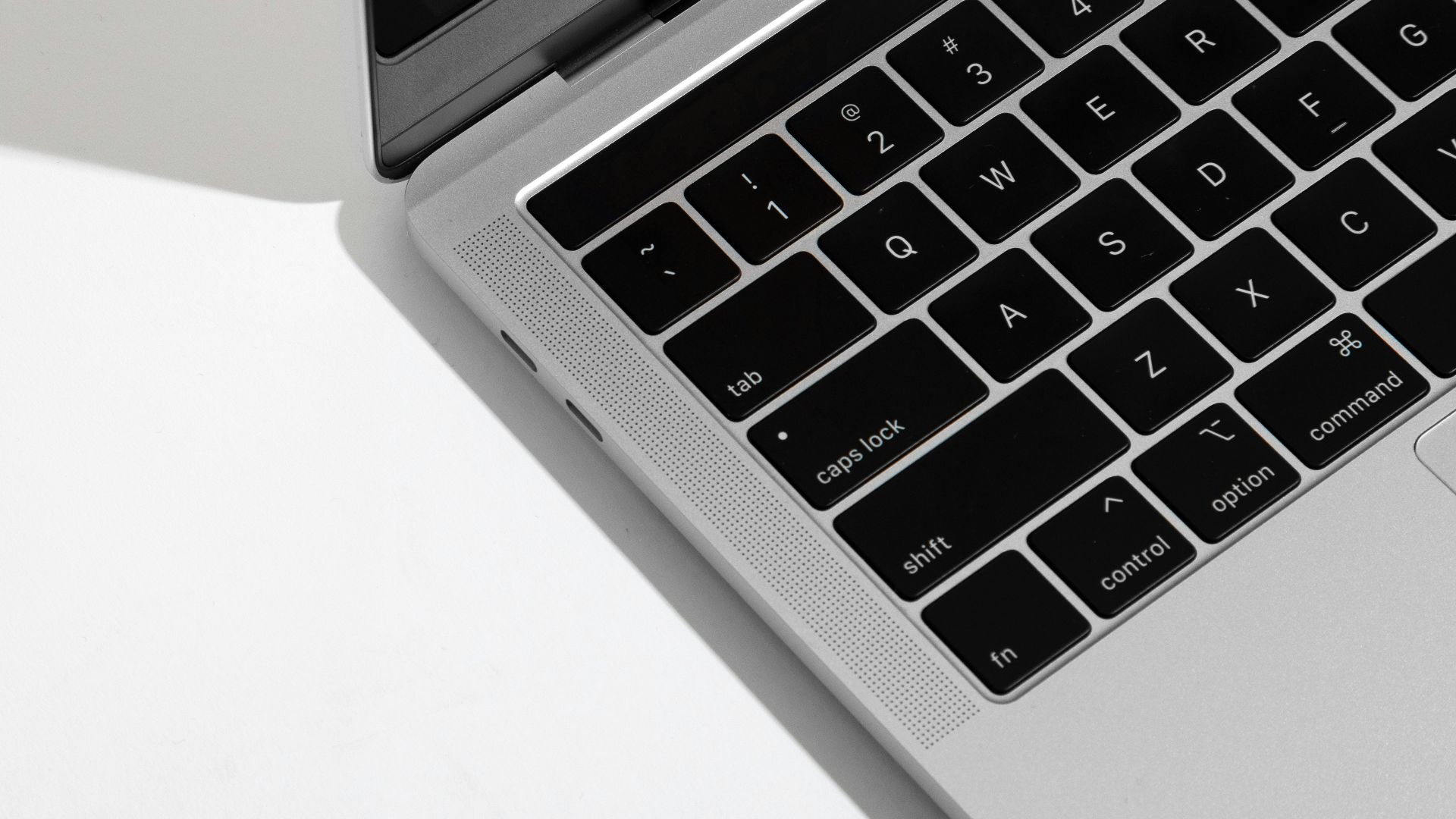 black and silver laptop computer