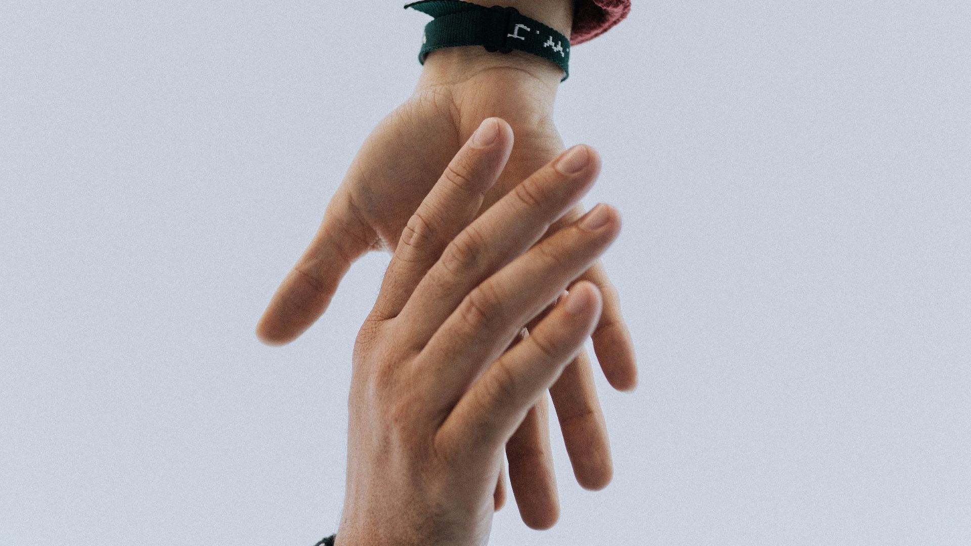 view of two persons hands
