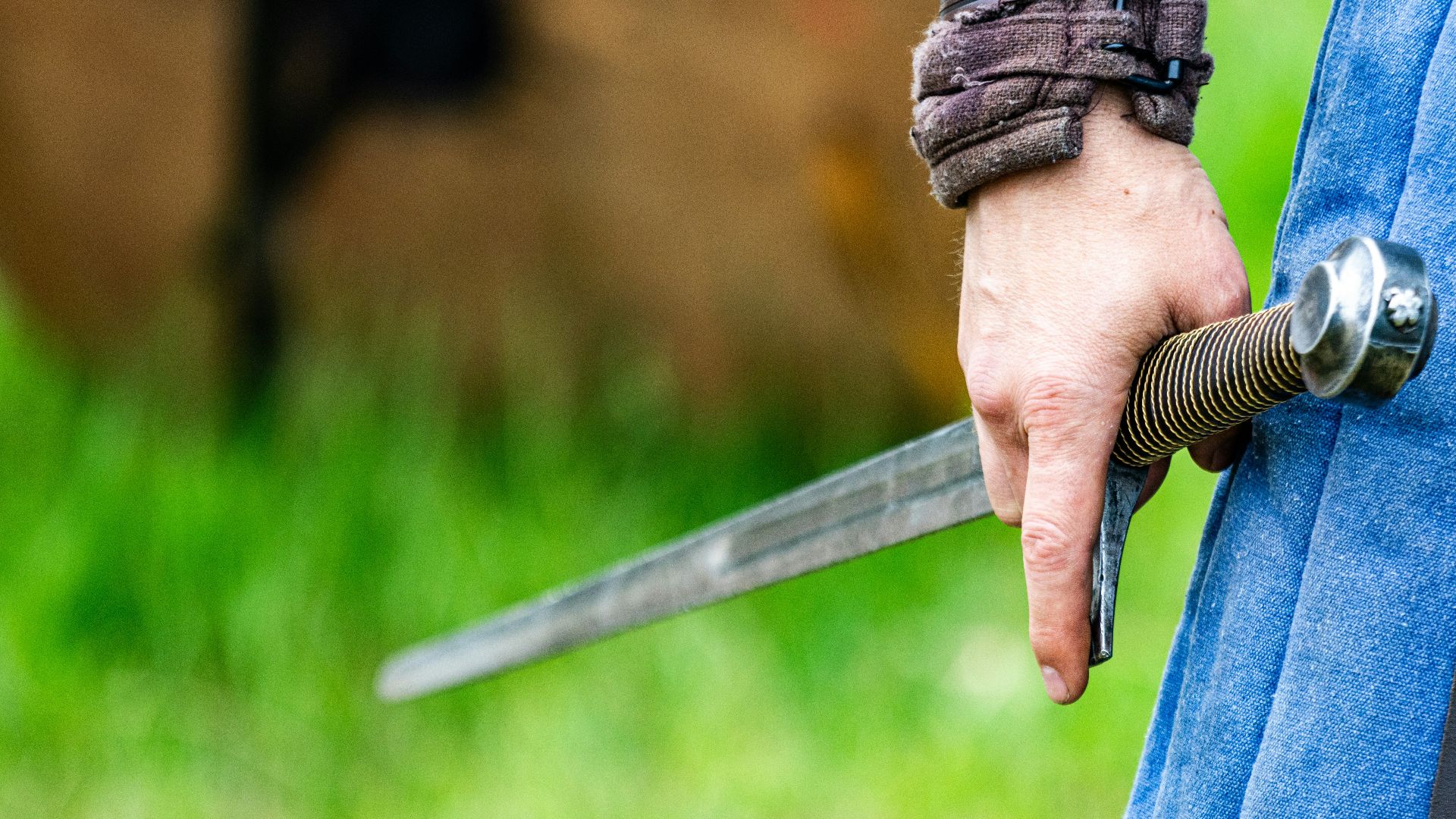 a person holding a knife in their hand