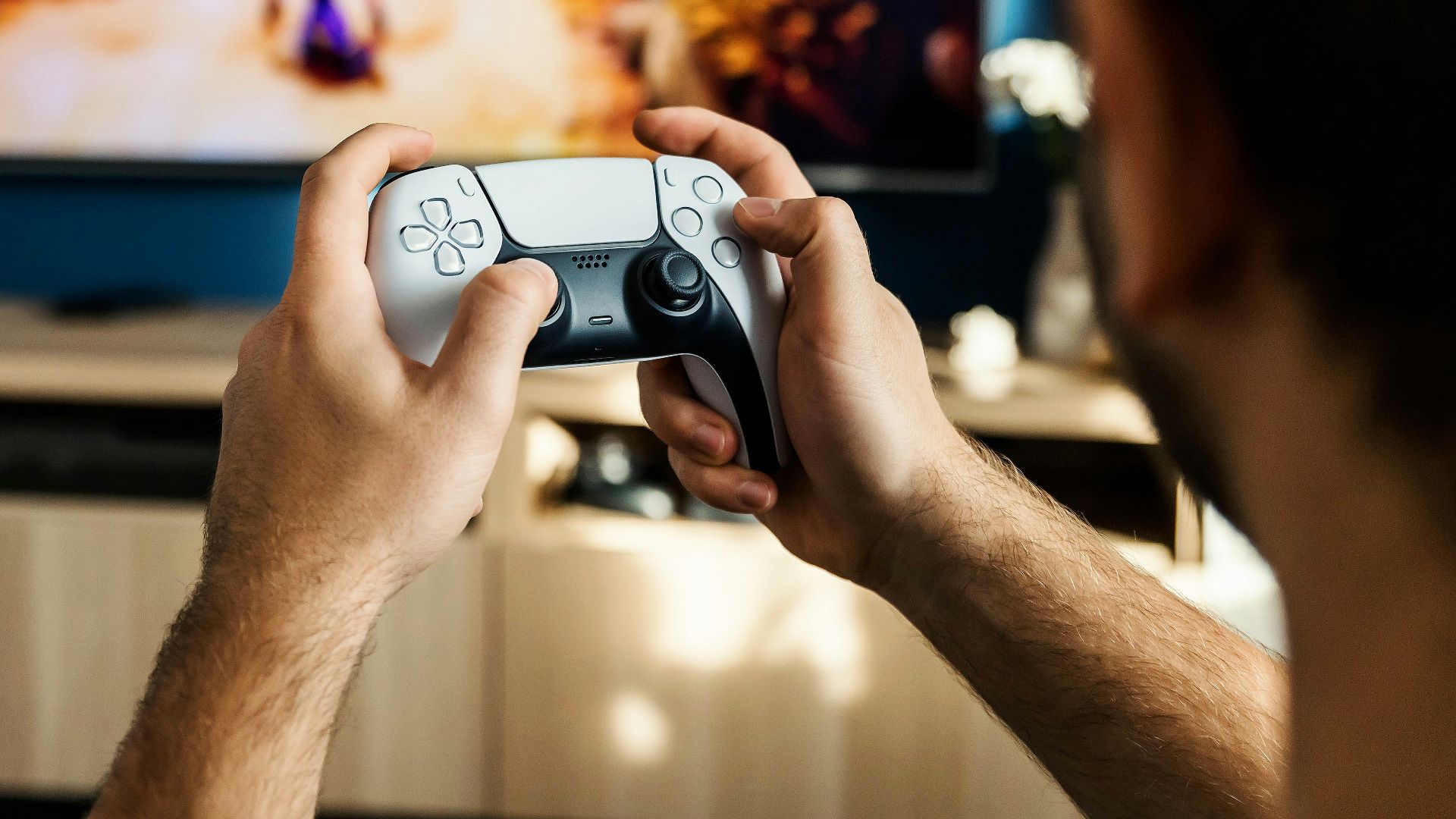 a man playing a video game on the nintendo wii