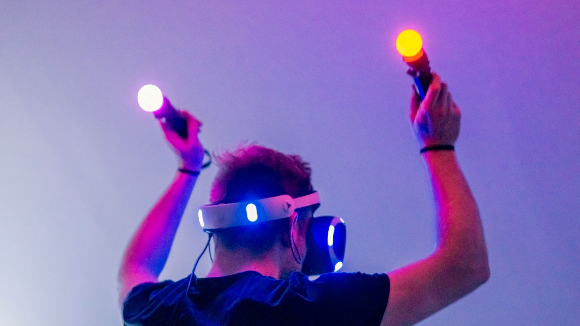 man playing using VR headset