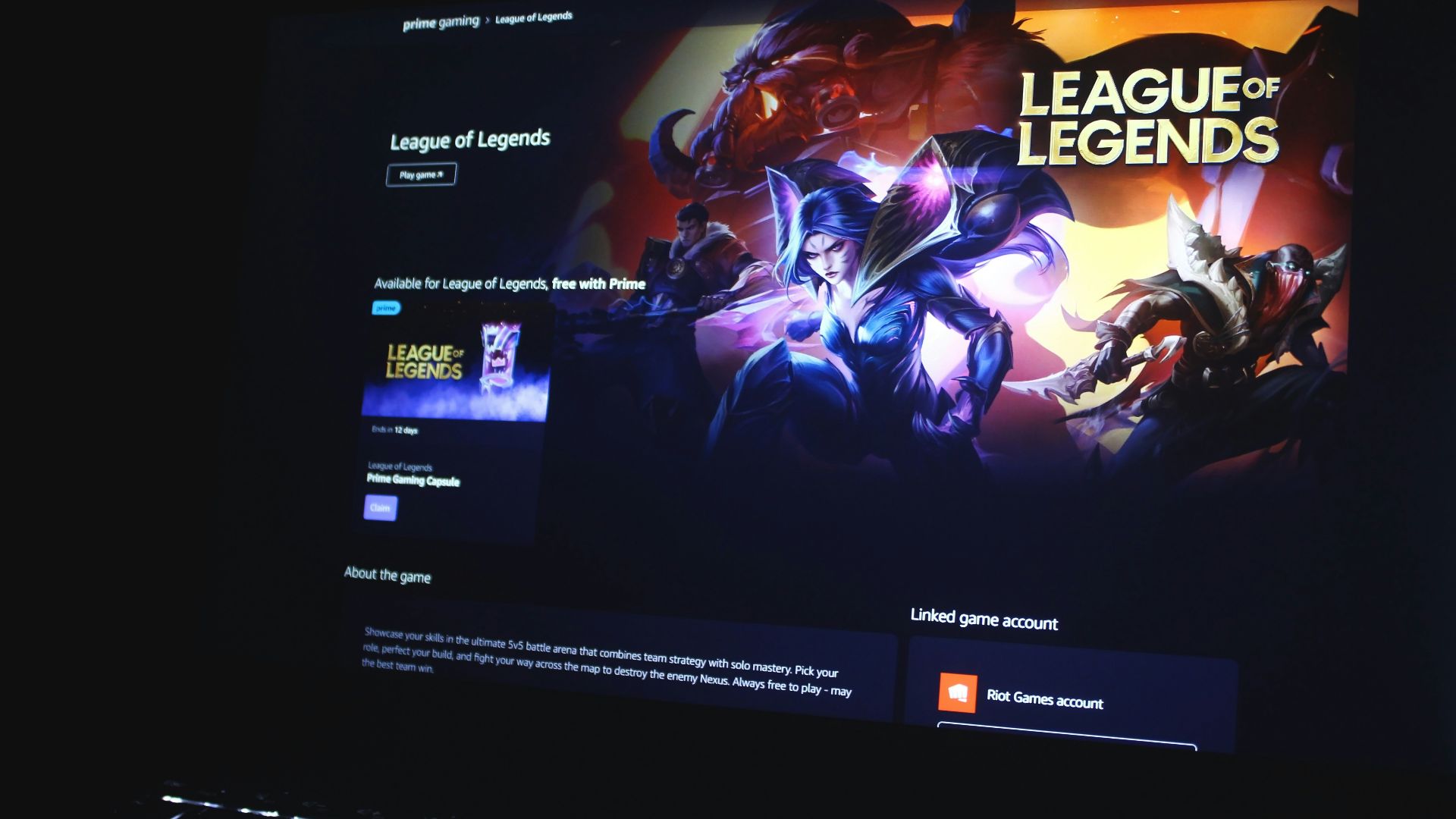 a computer screen with a league of legend logo on it