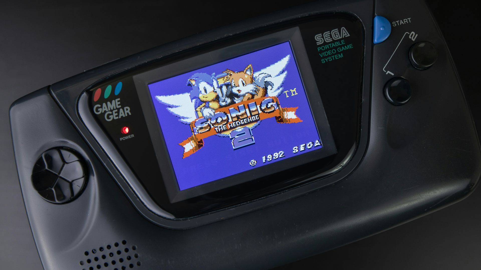 black sony digital device on black surface