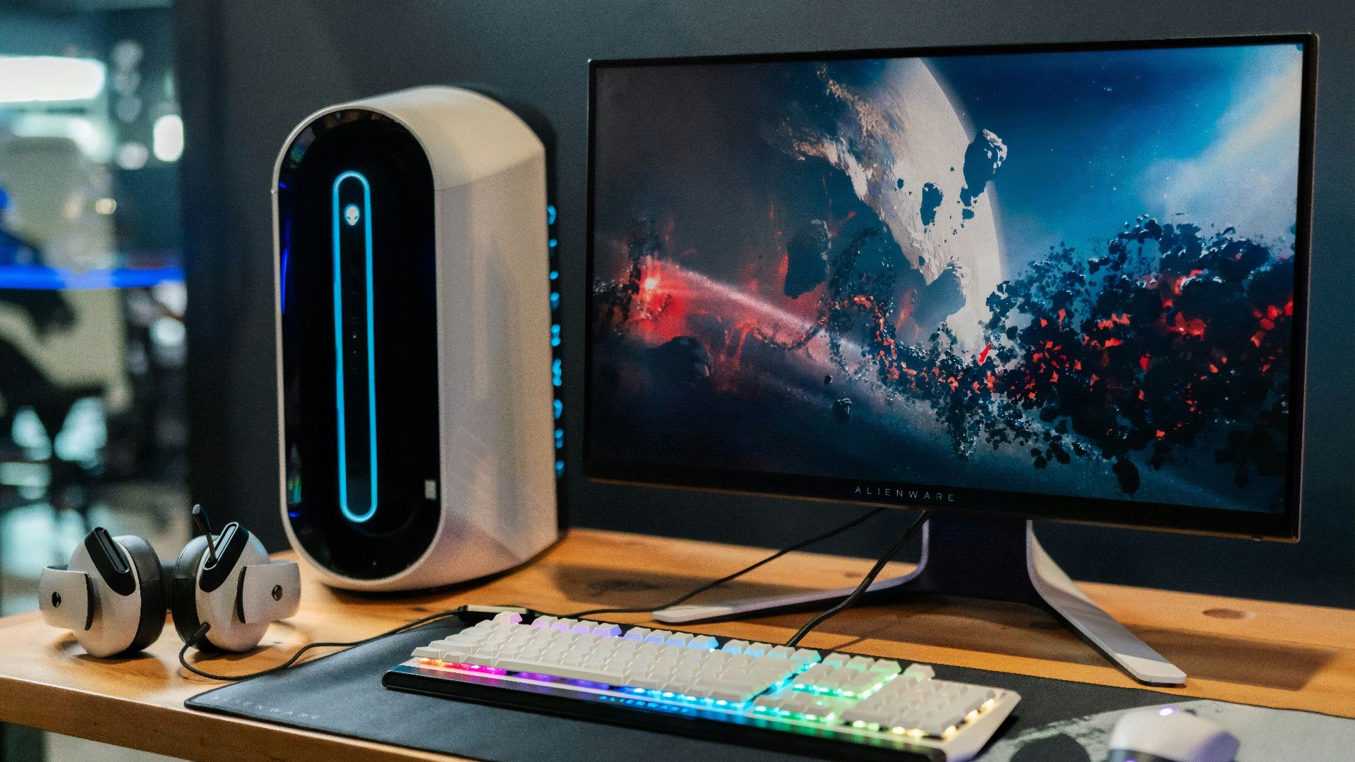 black flat screen computer monitor beside white computer keyboard