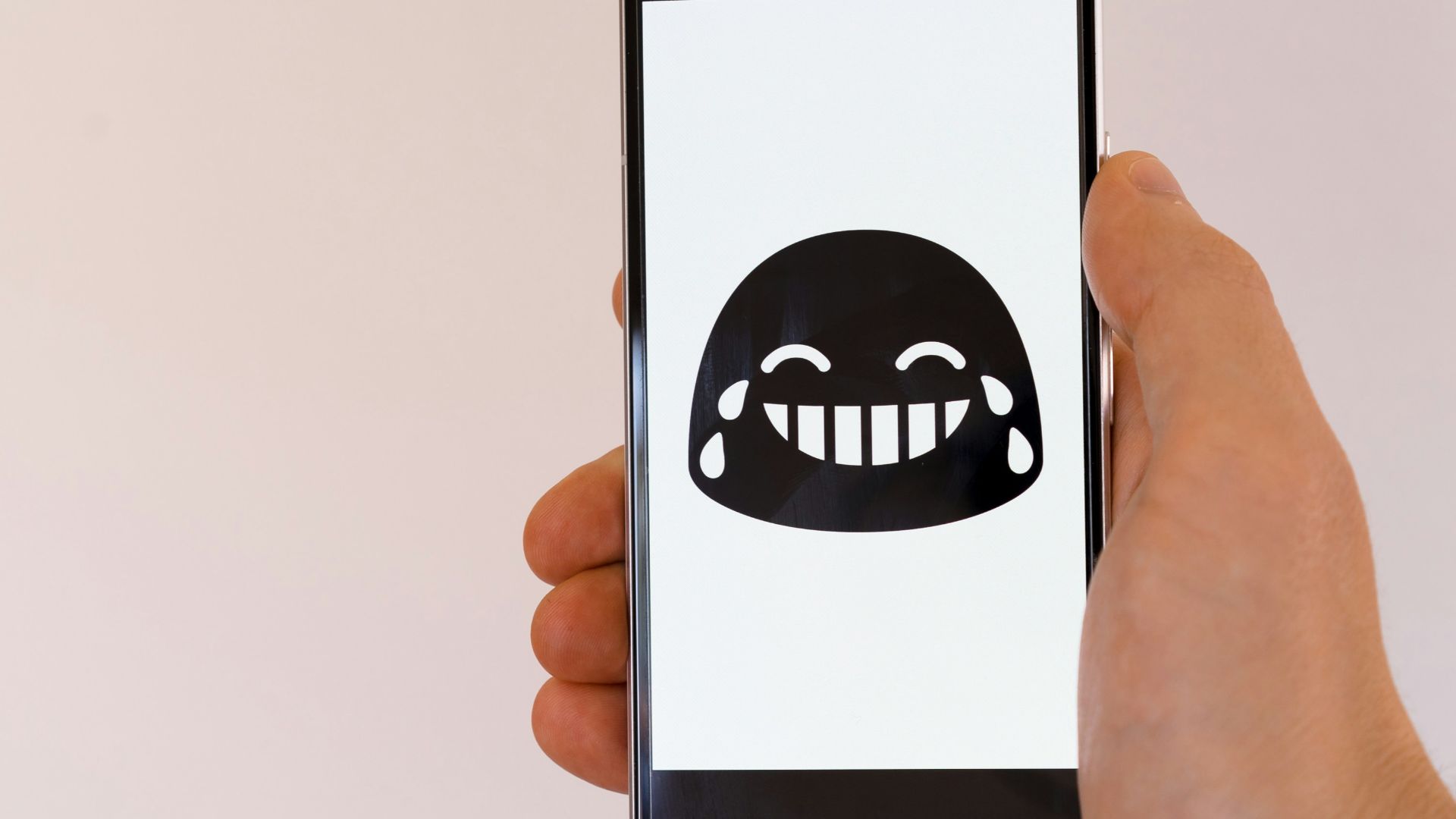 person holding black android smartphone