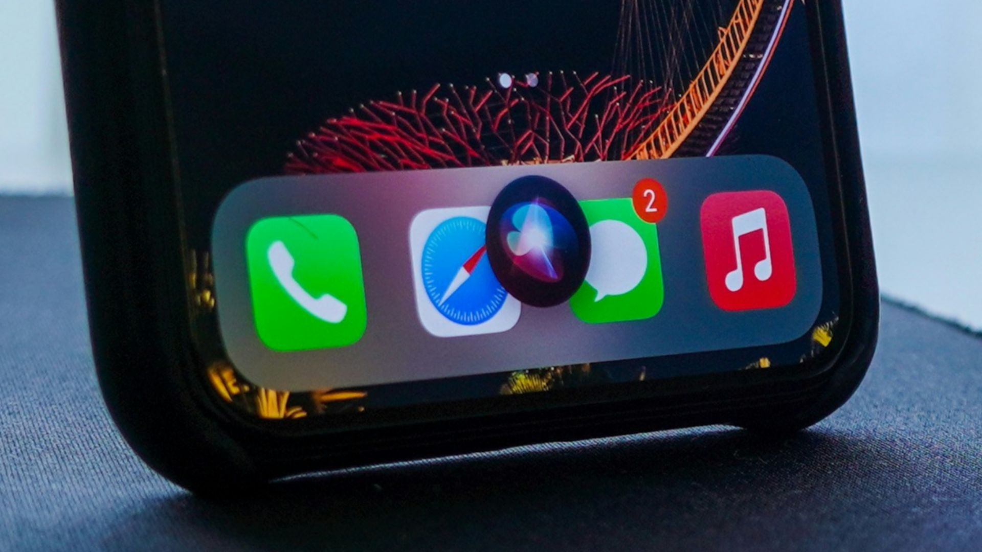 black iphone 5 on black table