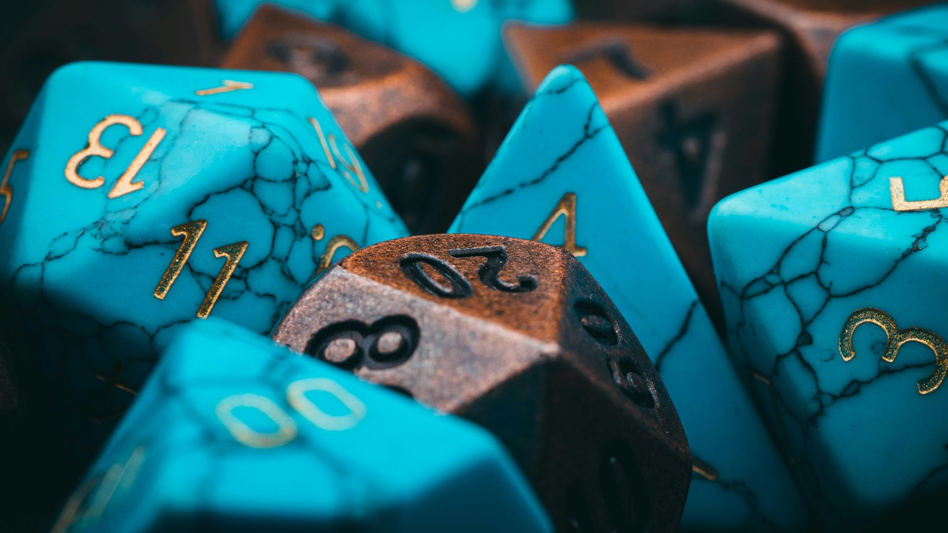 a group of blue and brown dice sitting on top of each other