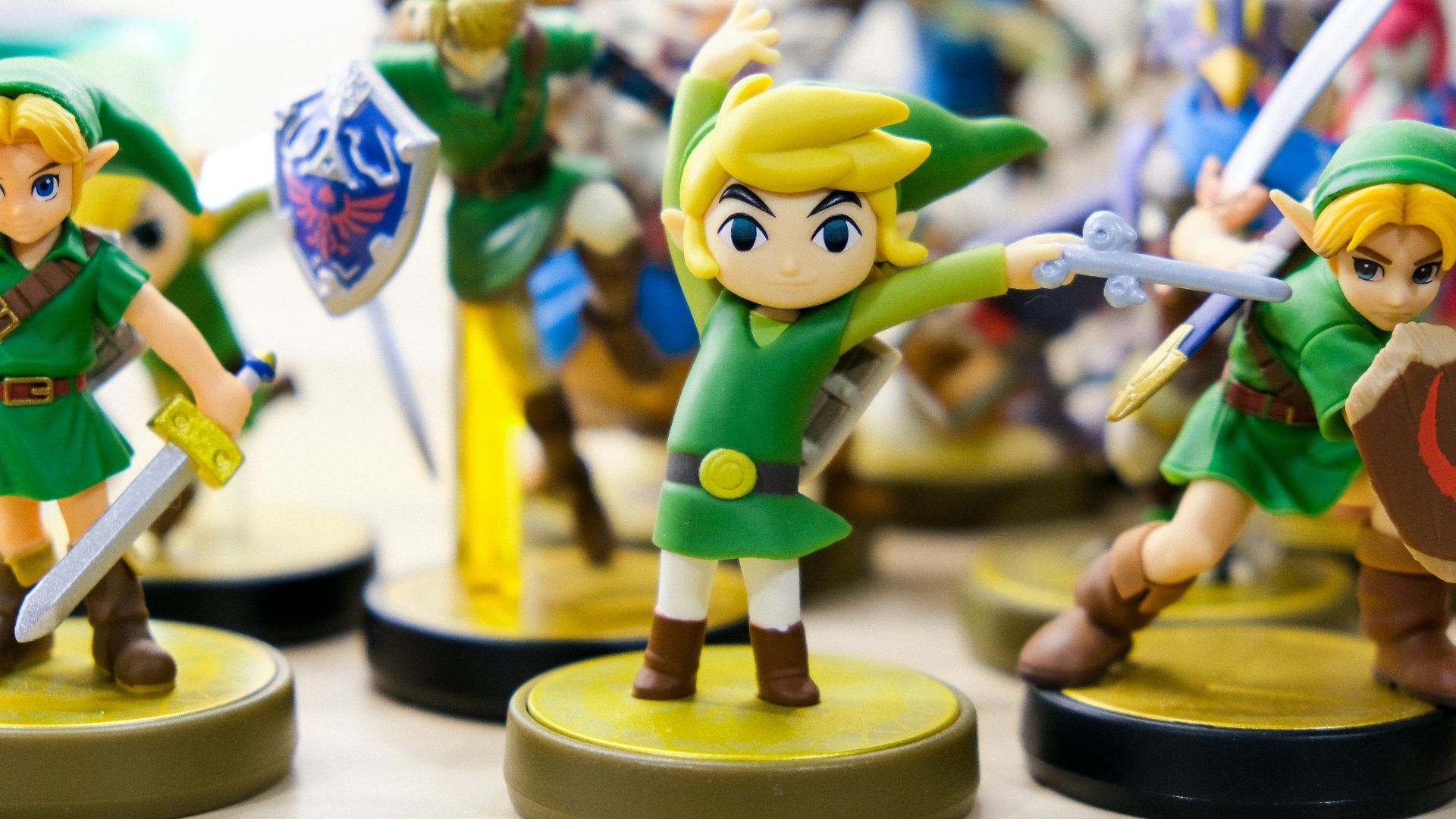 selective focus photography of Link vinyl figures