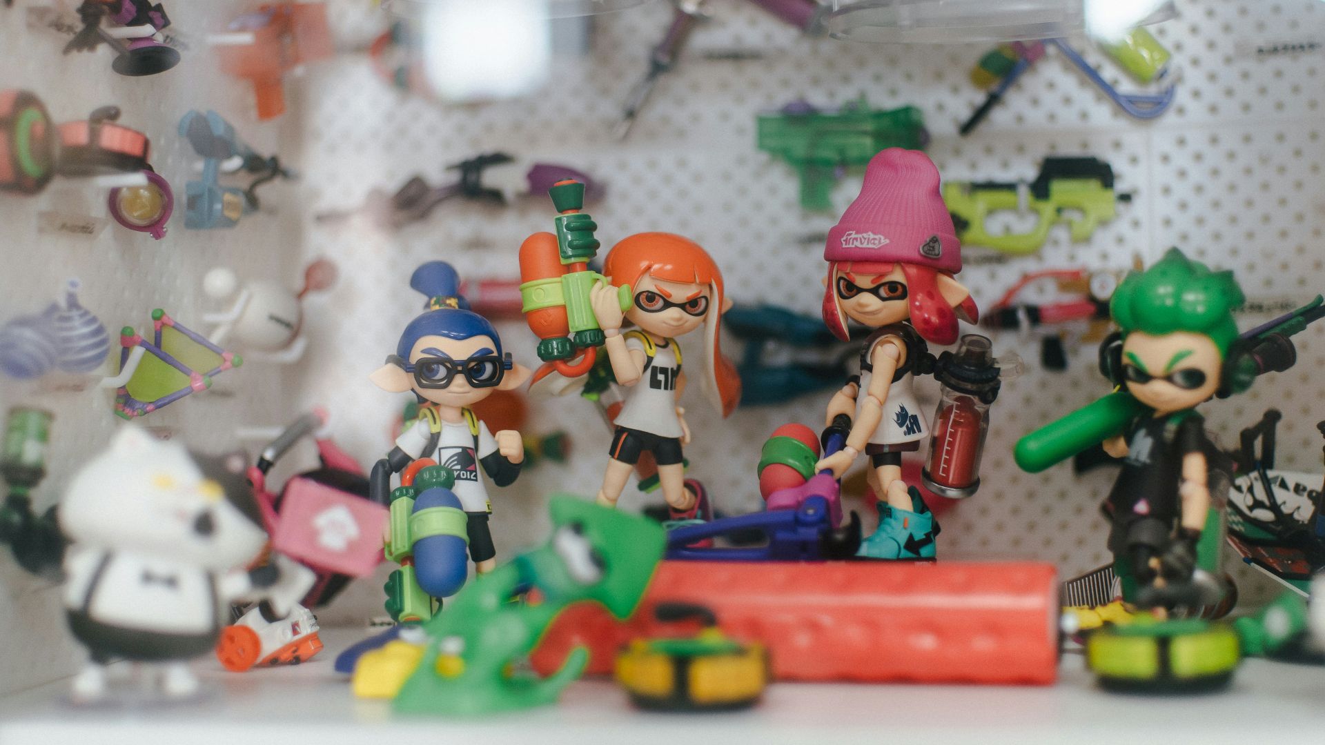 a group of toy figurines sitting on top of a table