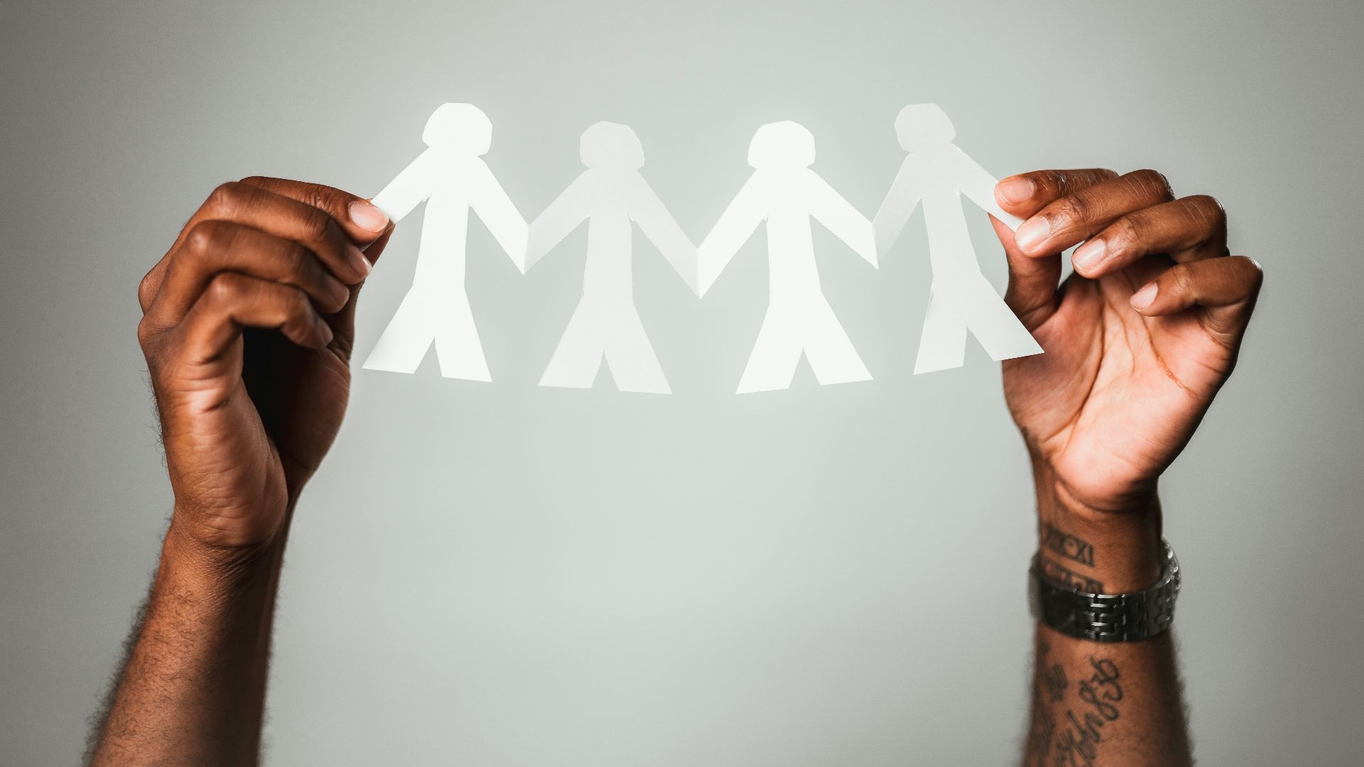 person holding white heart paper