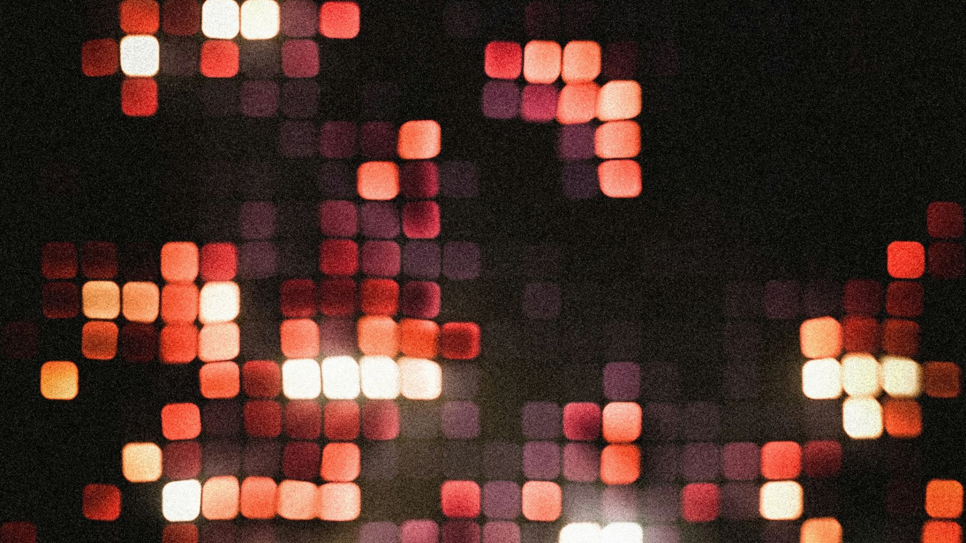 a blurry image of a city at night