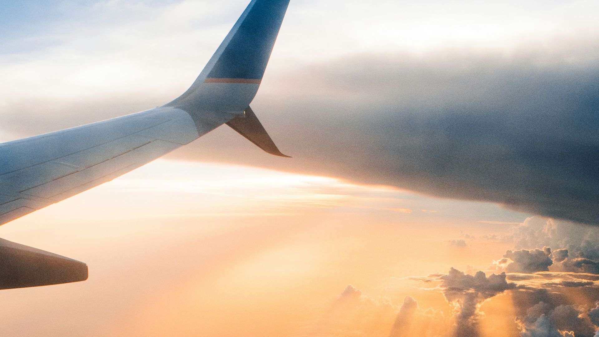 airplane on sky during golden hour