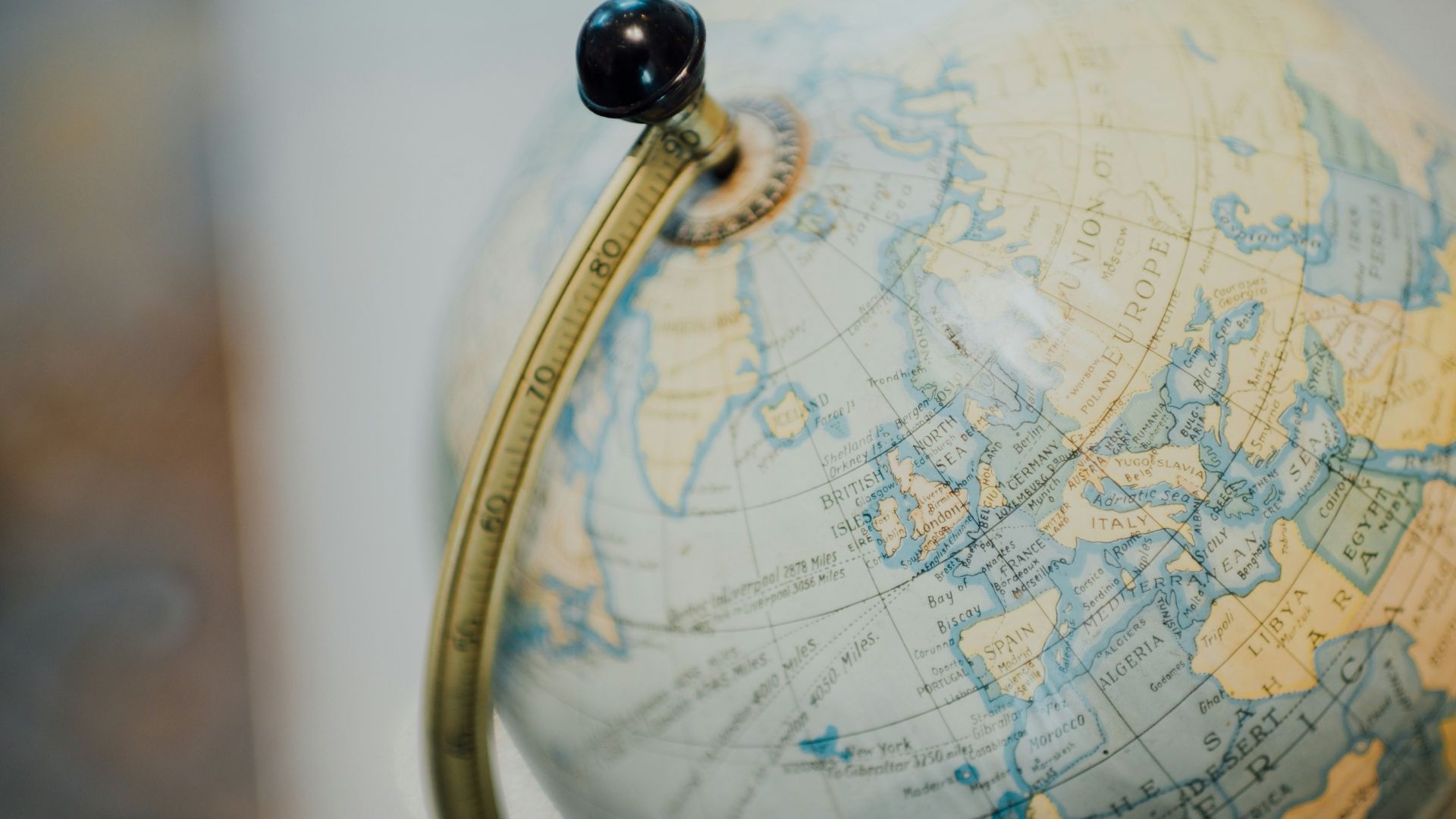 gold and silver desk globe