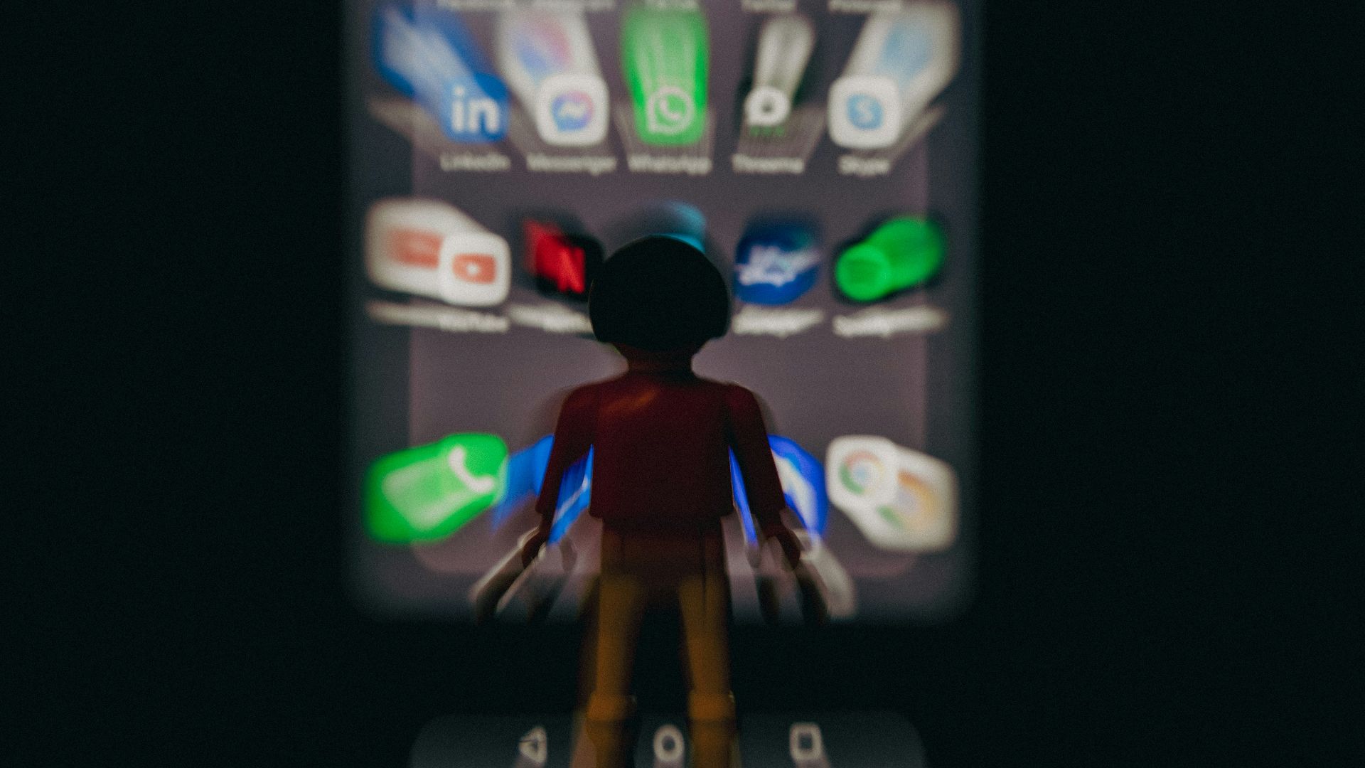 a person standing in front of a cell phone
