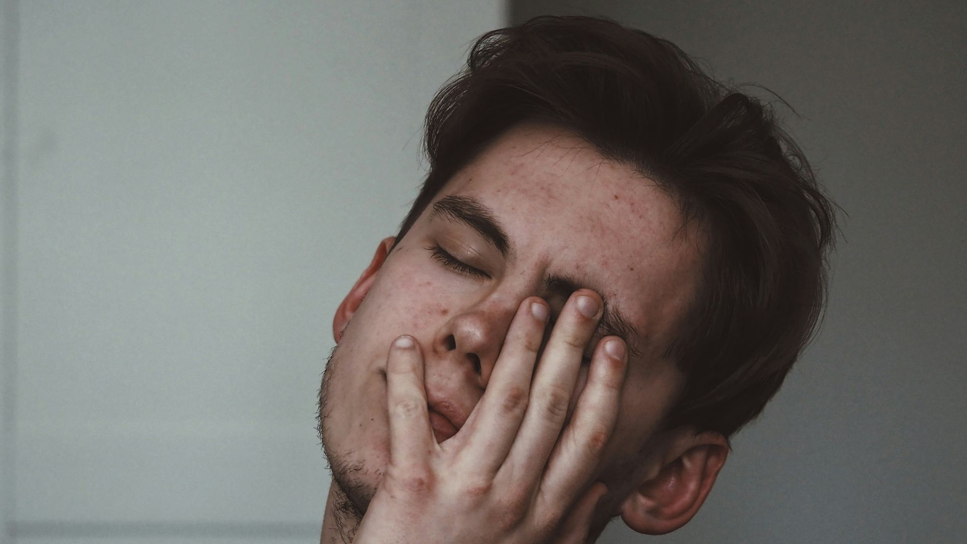 man wearing black crew-neck top