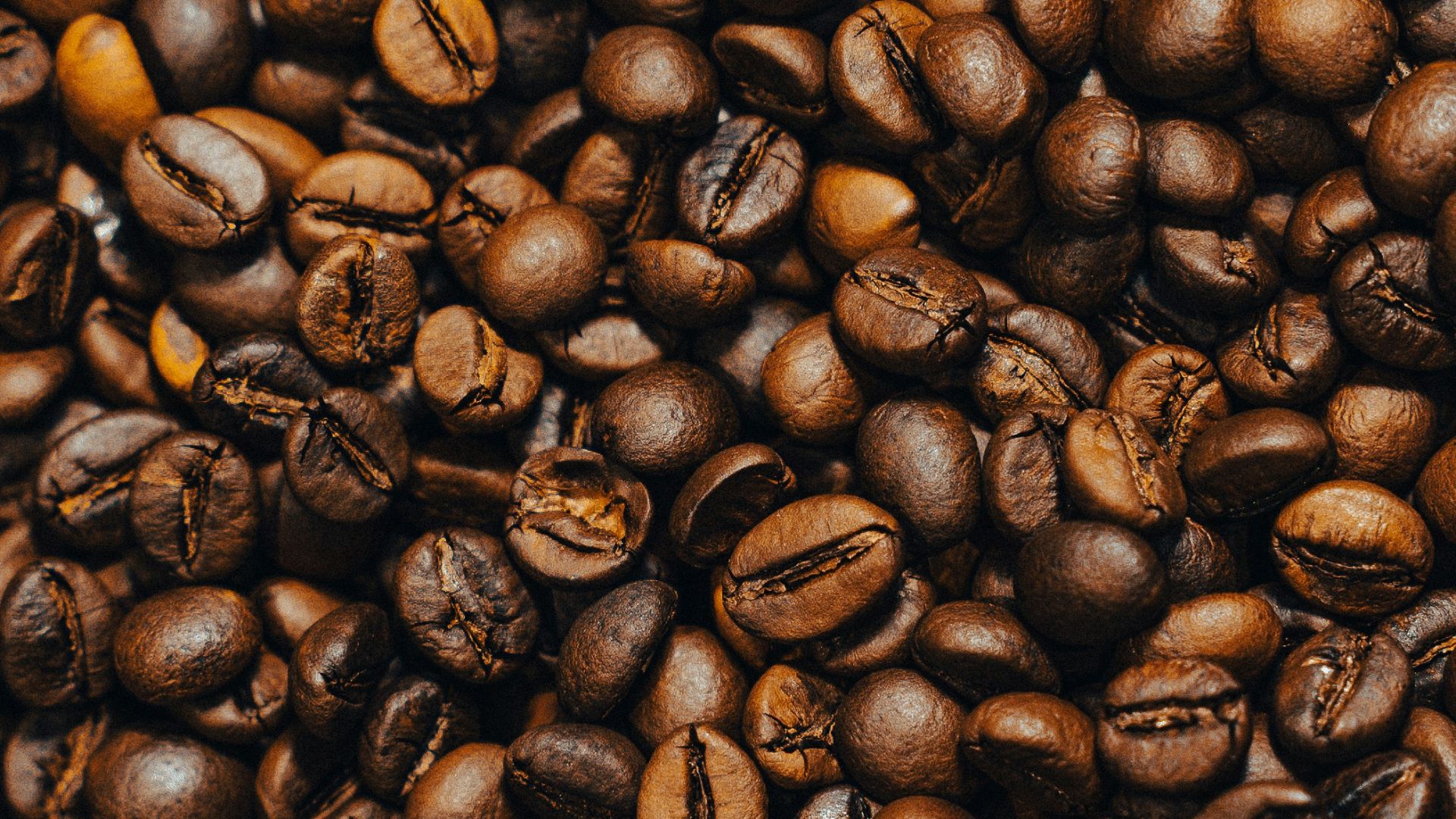 a pile of coffee beans and coffee beans