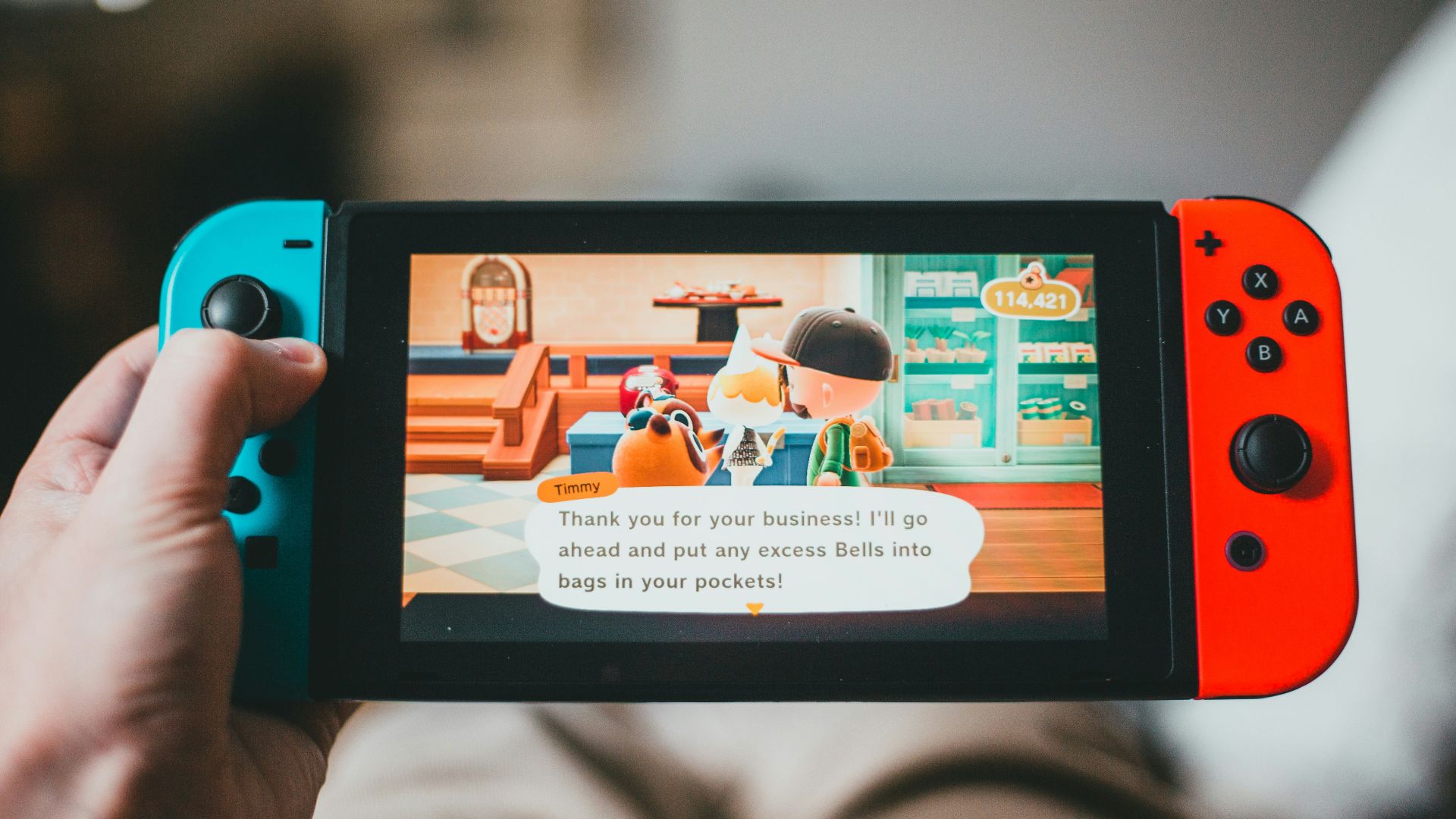 black android smartphone displaying man in white shirt