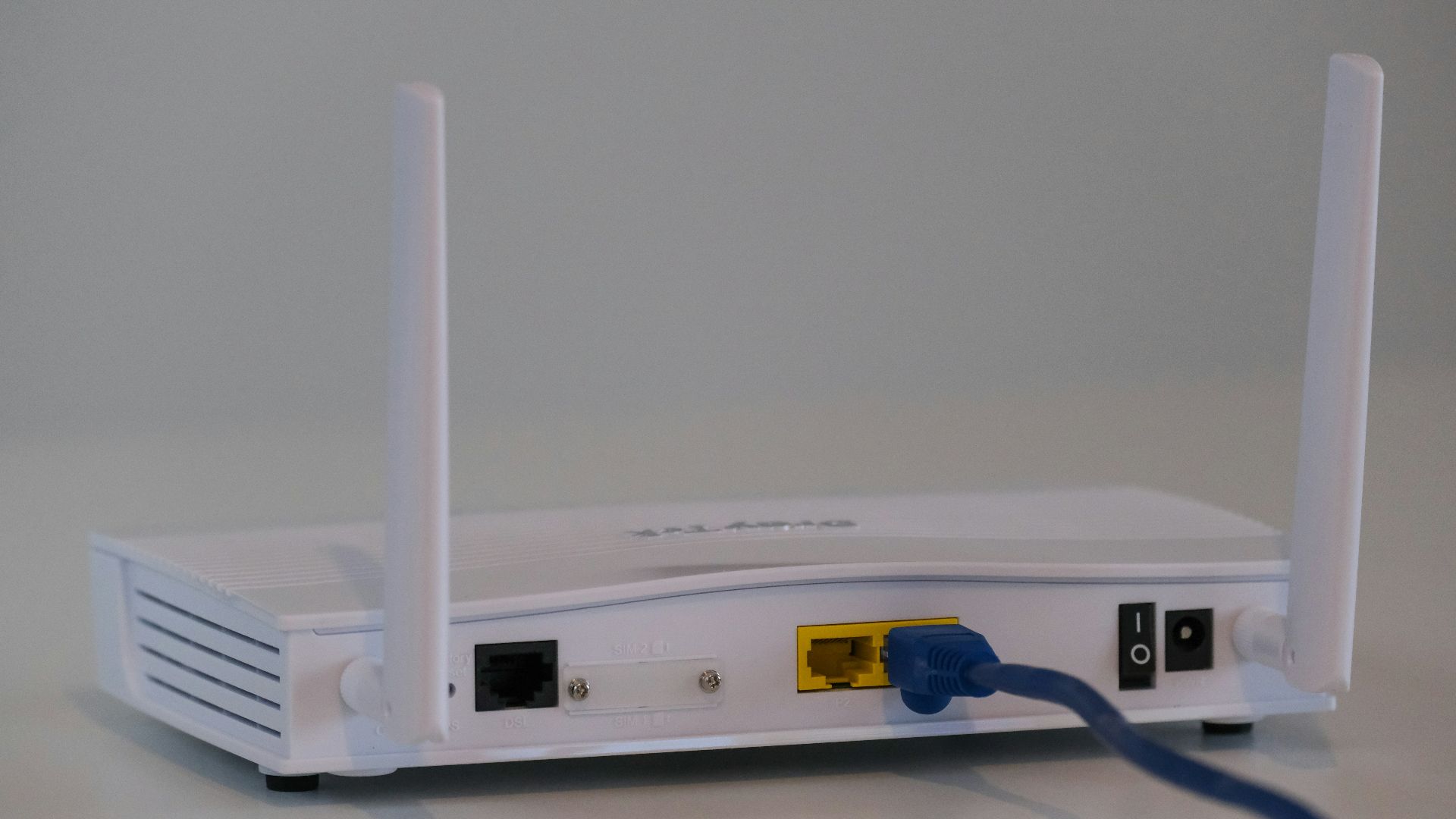 white router on white table