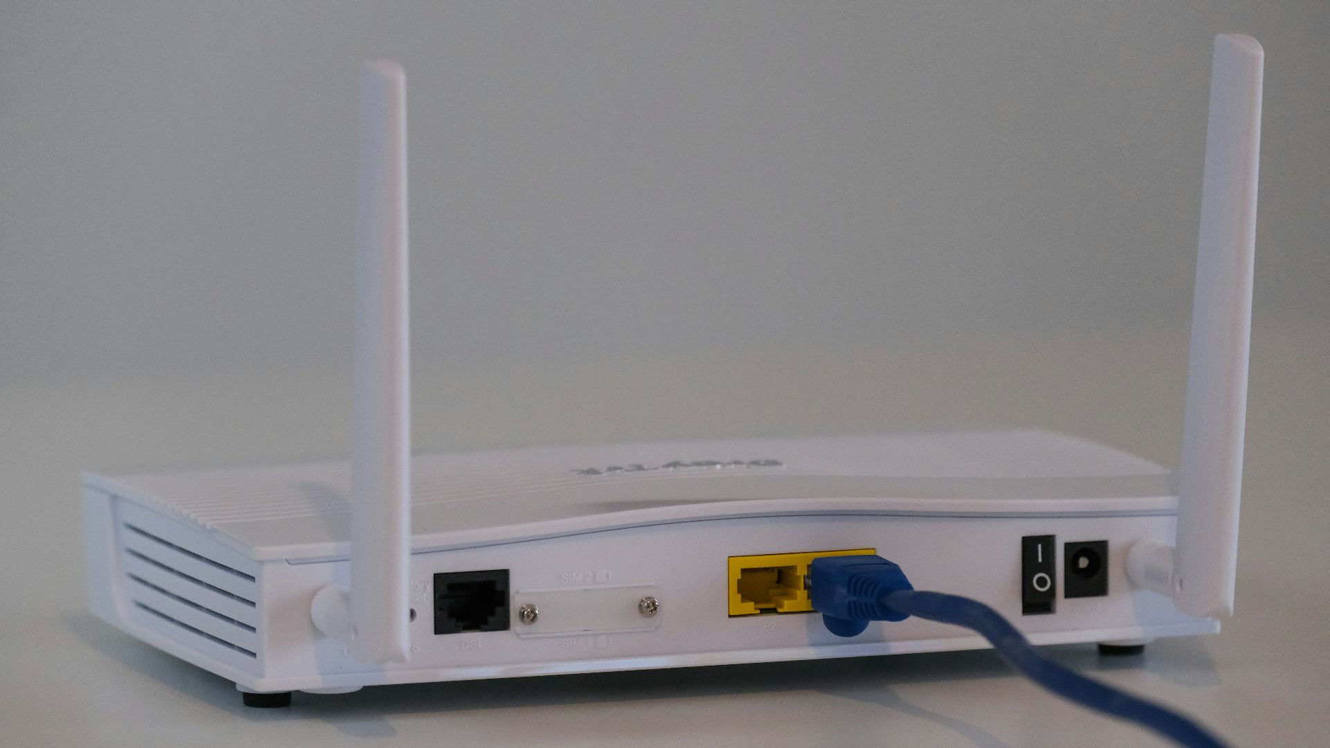 white router on white table
