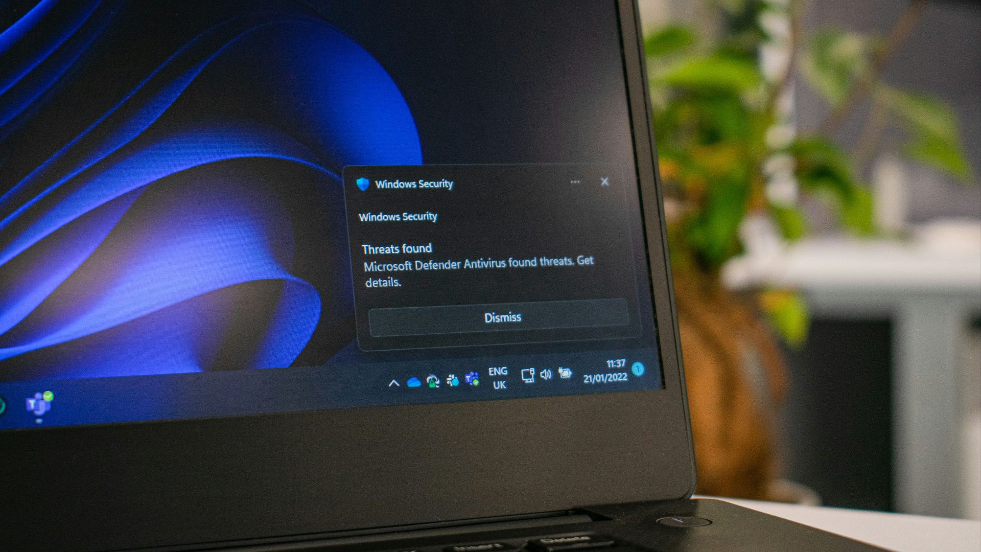 a laptop computer sitting on top of a table