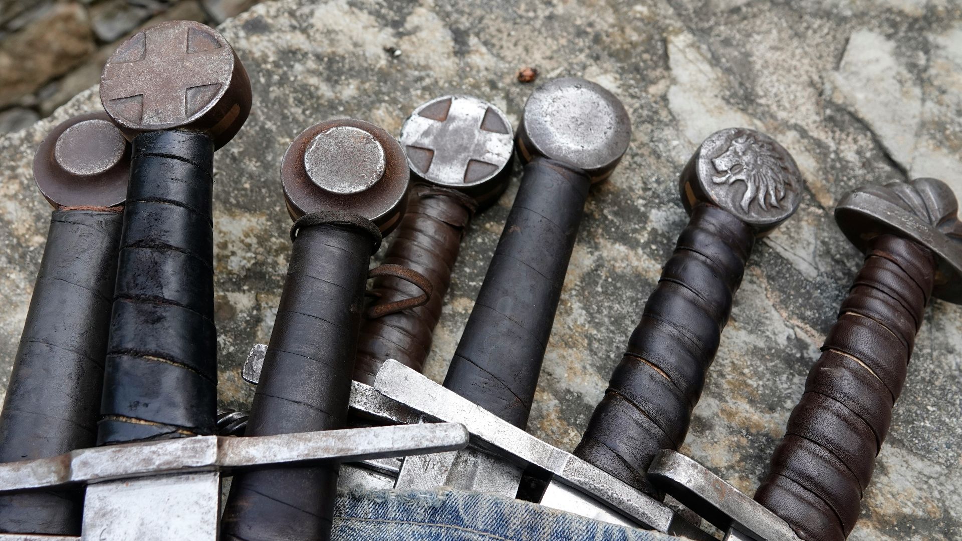 a bunch of different types of tools on a rock