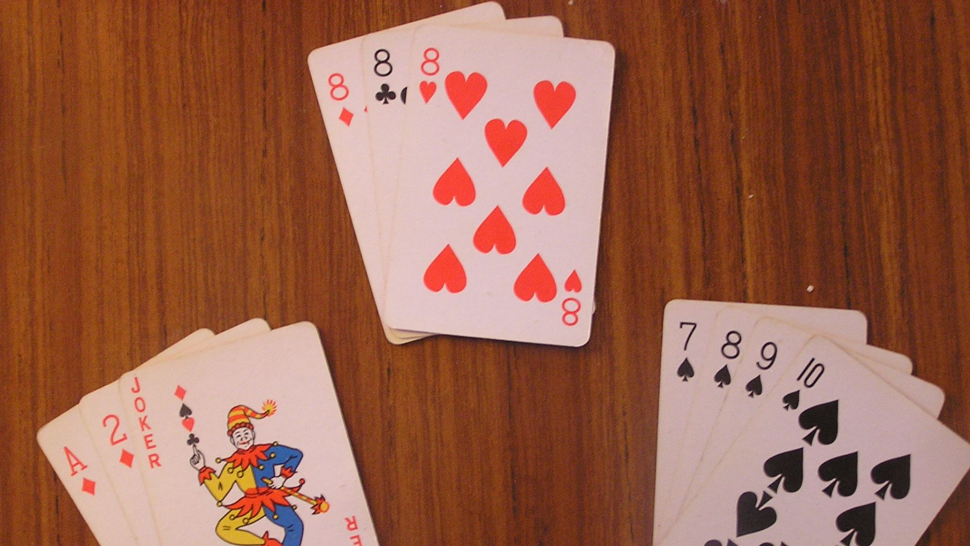 File:Rummy (game)-card deal.JPG