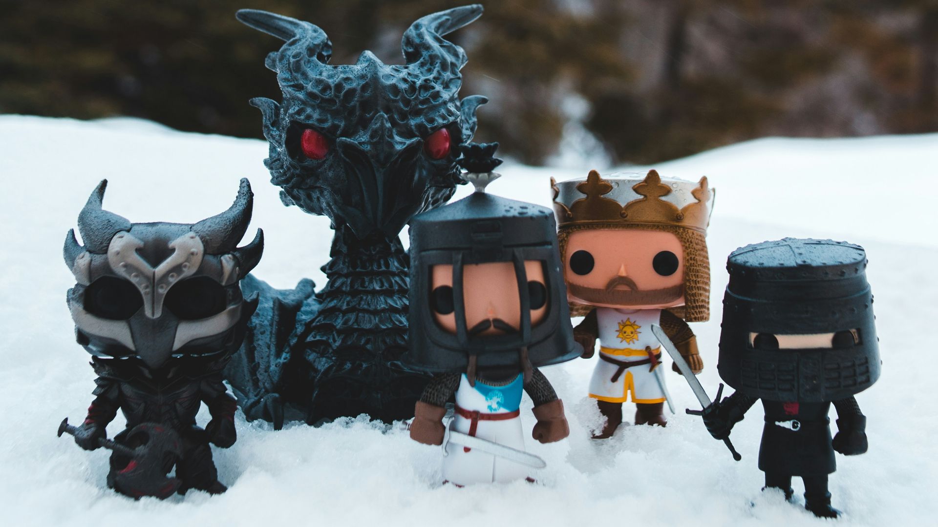 brown and black robot toys on snow covered ground