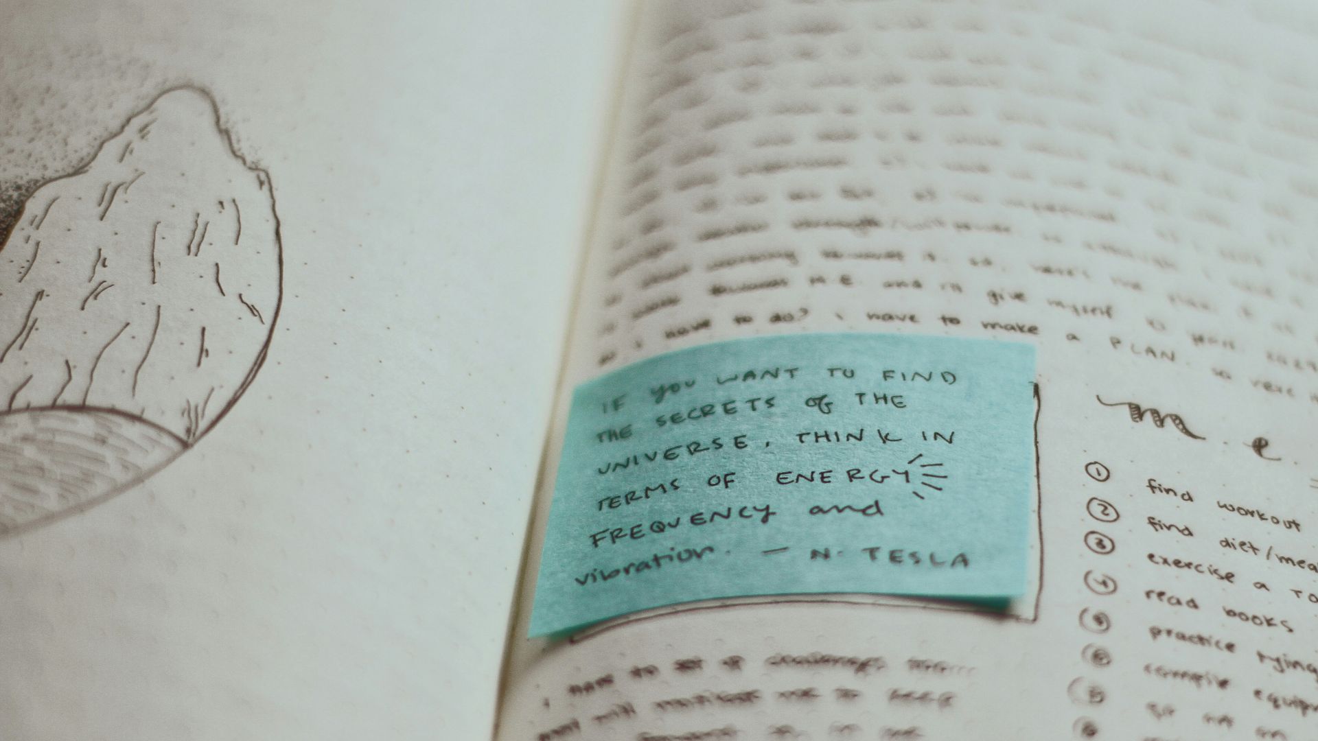 blue card on top of opened book