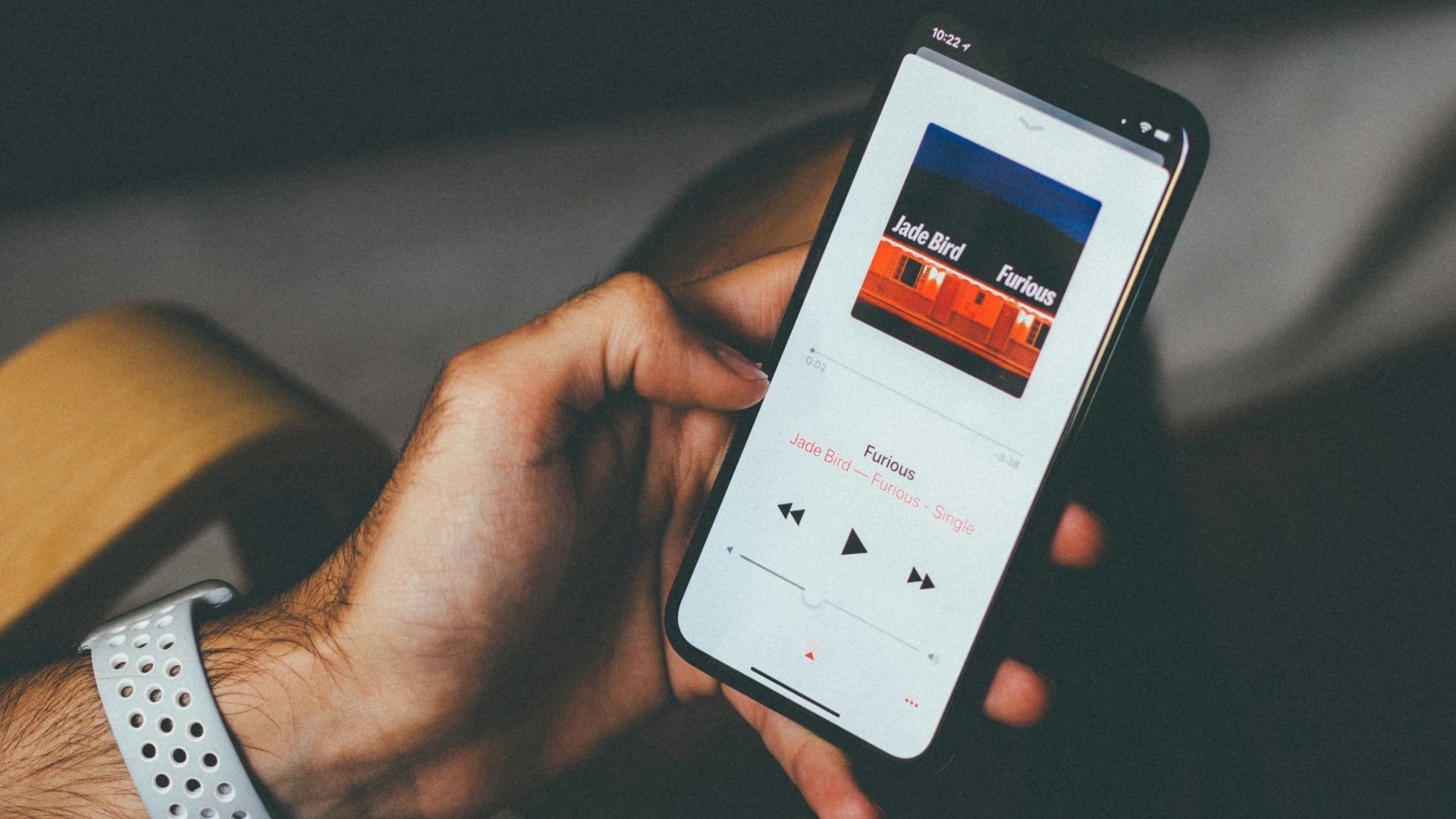 person holding black Android smartphone turned-on