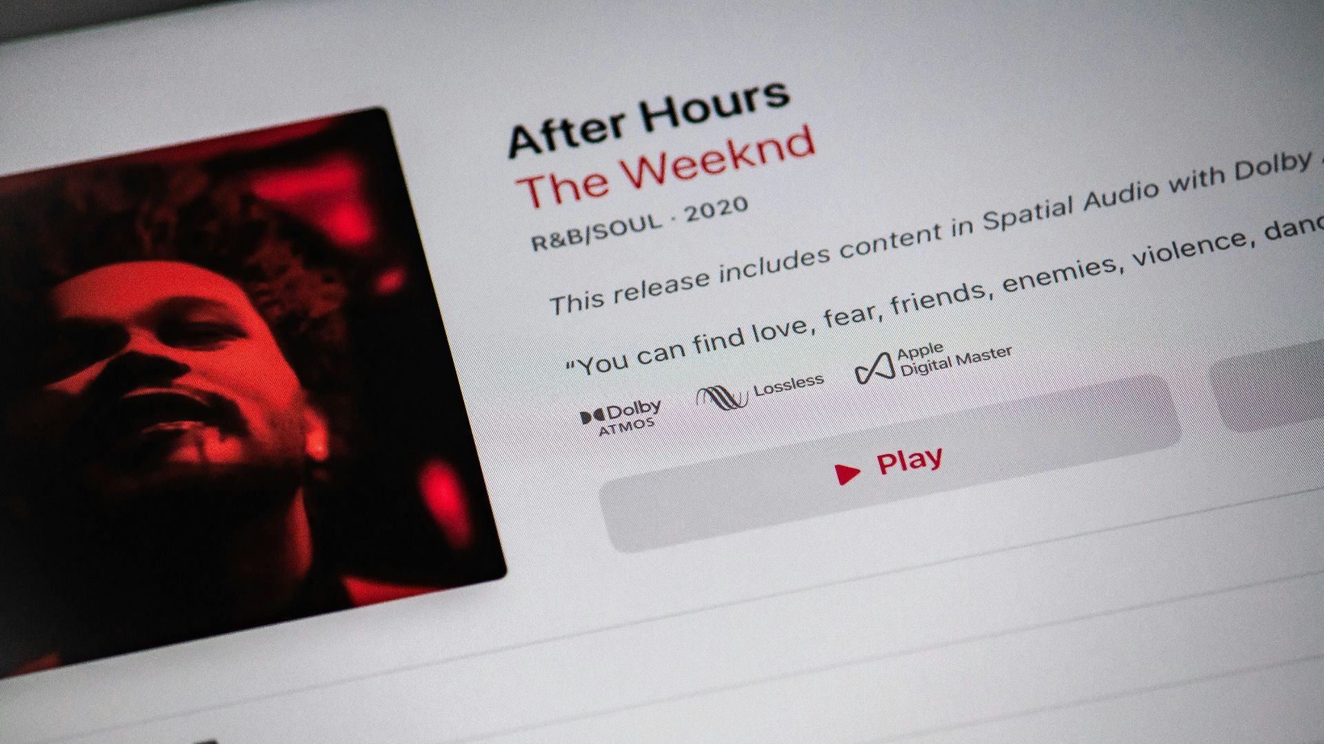 black flat screen tv turned on displaying man in black suit